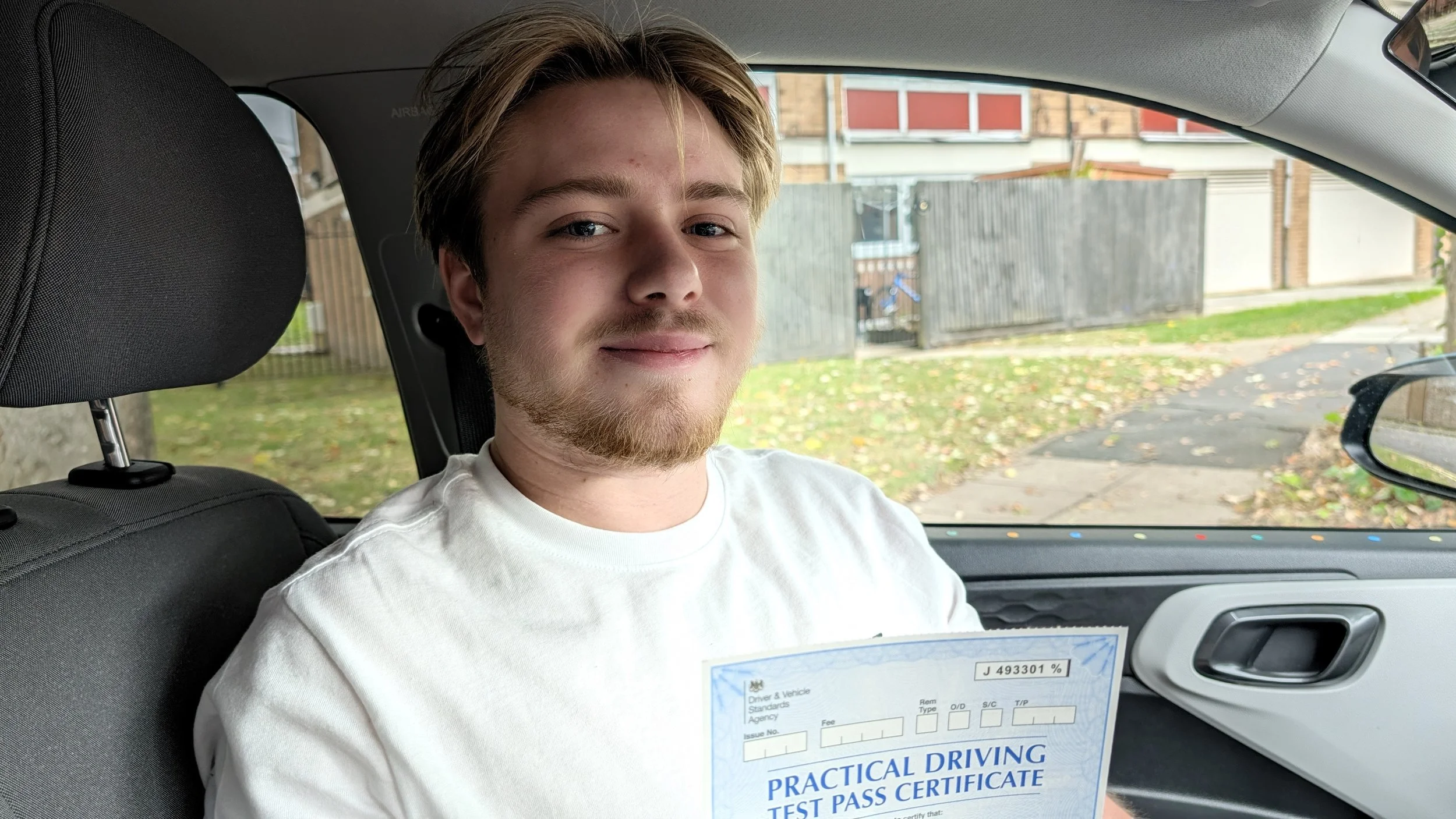 George passes his driving test first time
