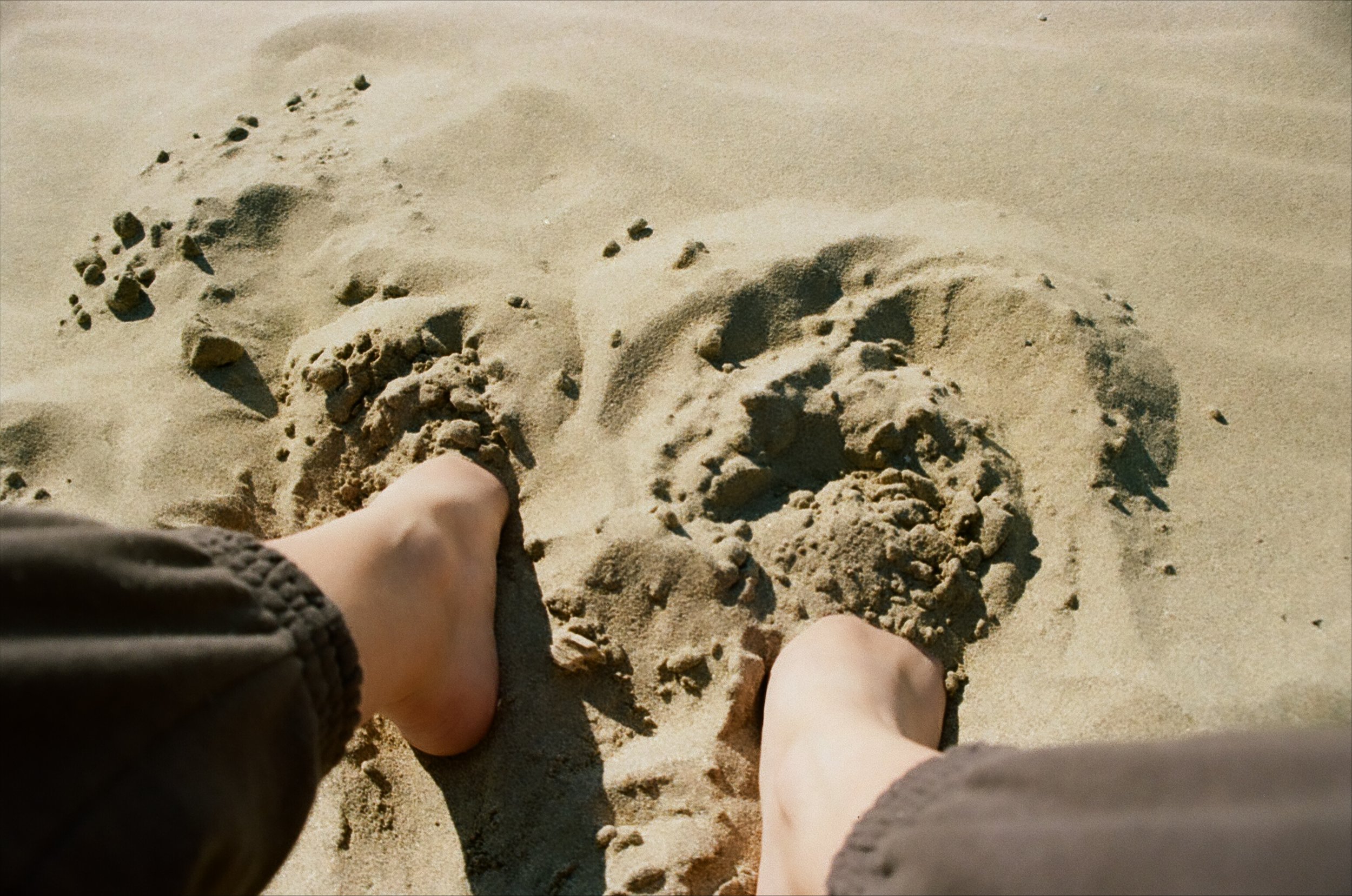 feet in sand.jpeg