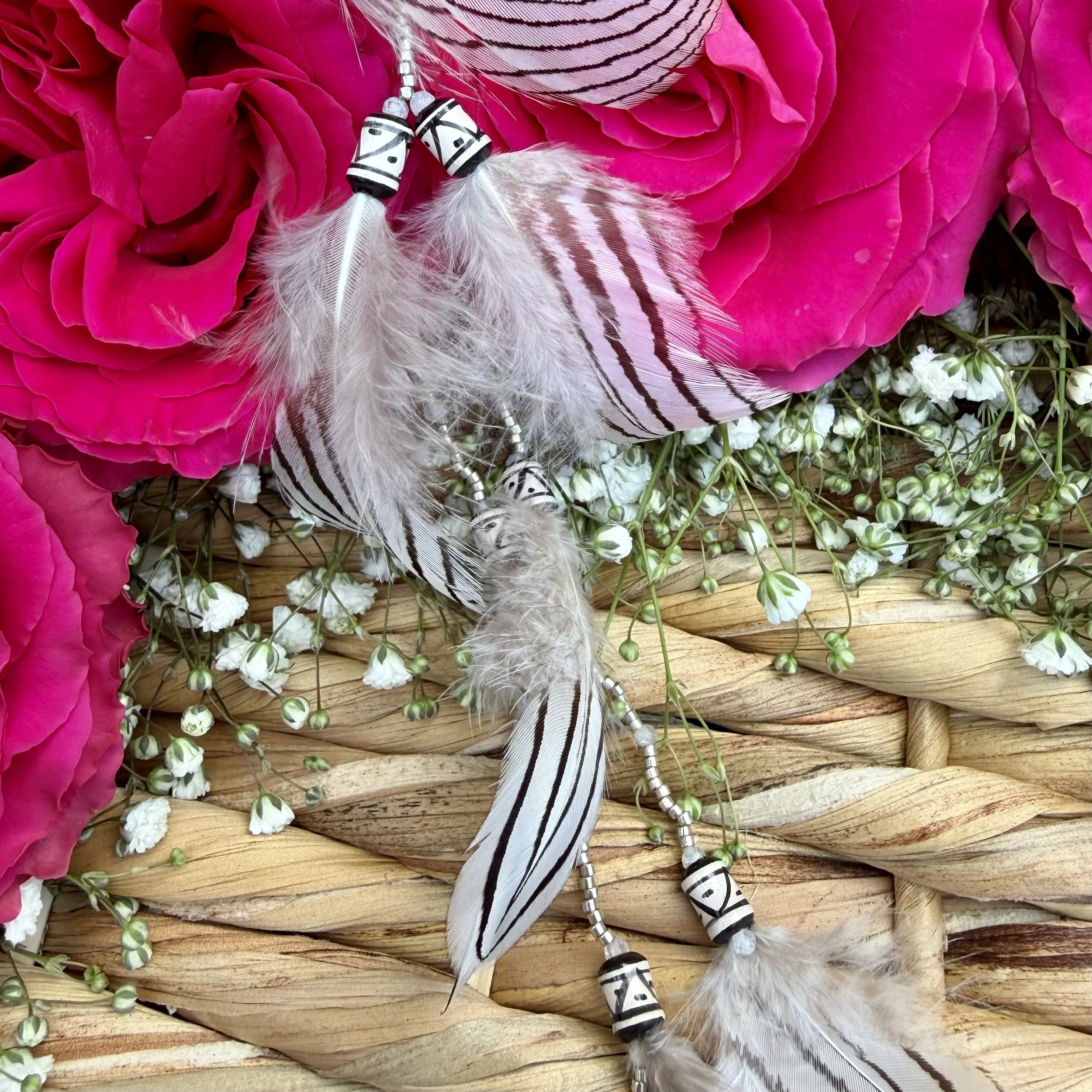 Silver Pheasant Feather Ceremonial Earring with Sterling Silver Beading - Close up photo - Handmade by an artisan. One of a kind.