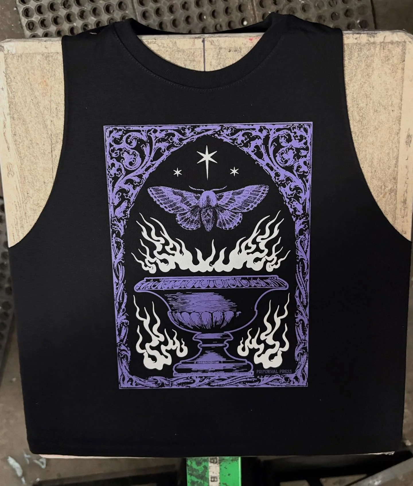 Here at my bud&rsquo;s shop @blackcollarscreenprinting printing tanks for @odditiesandcuriositiesexpo in Baltimore this weekend! I will be premiering this new design there, so come say hi and get some cool stuff!