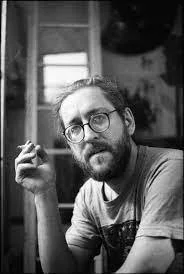 A black and white photograph of the artist Leonid Purygin