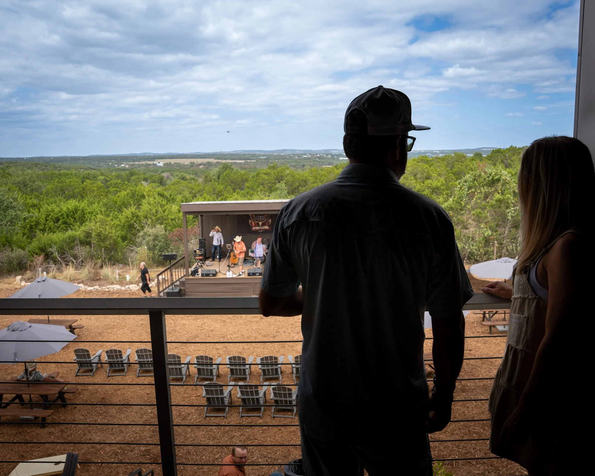 a balcony overlooking the hill country