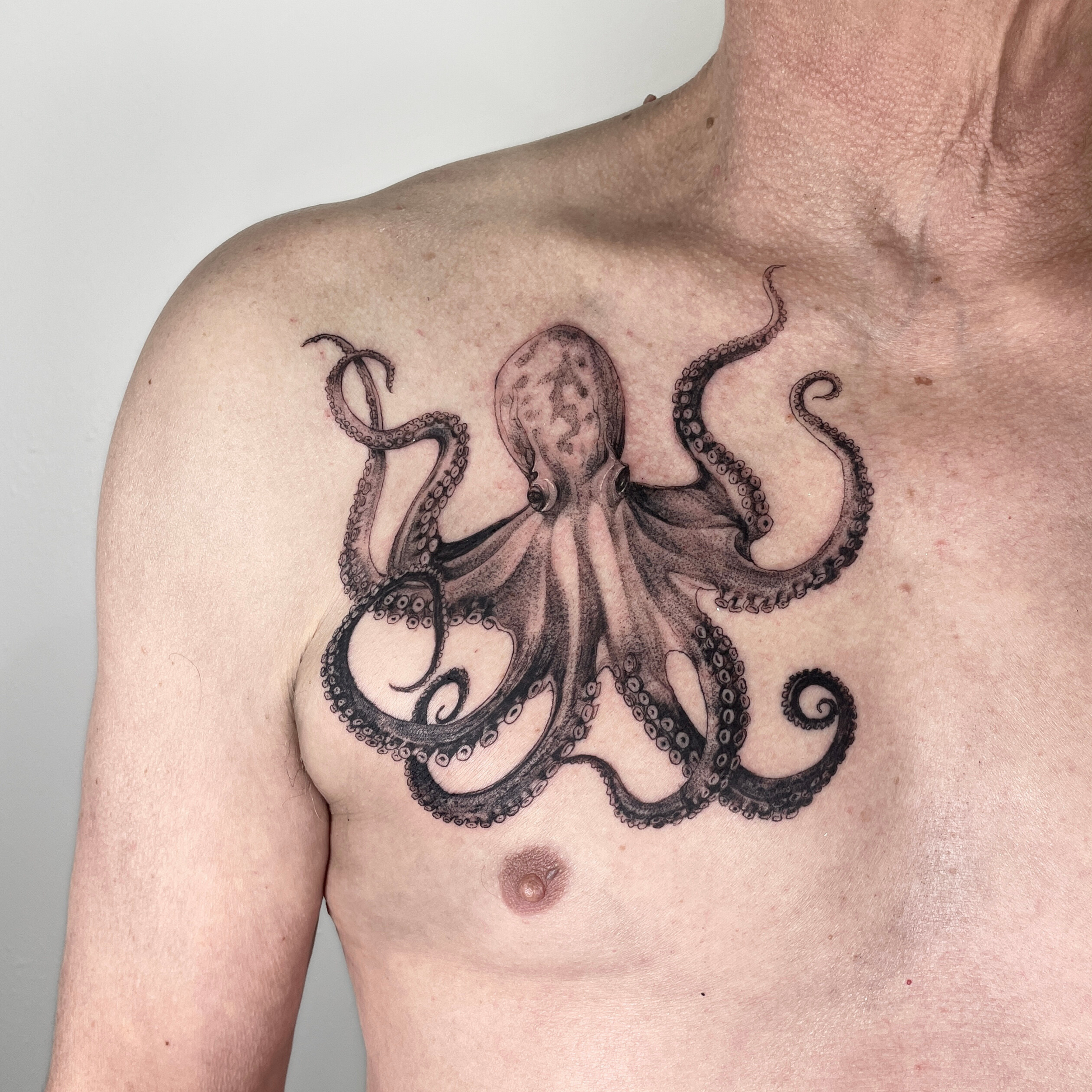 Realistic Octopus Tattoo. My client is 64 years old. First time getting a tattoo