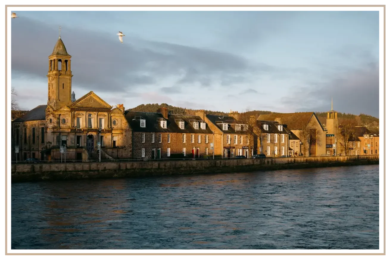 Explore the charming riverfront and historic streets of Inverness. Mindset Travel designs custom Scottish itineraries with luxury stays and private touring.