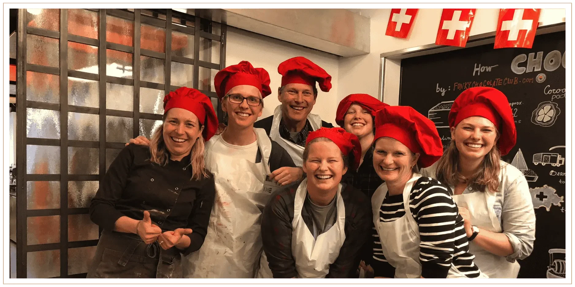 The Miller family of 6 having fun at a private chocolate making class in Lucerne, Switzerland, with the chocolatiers.