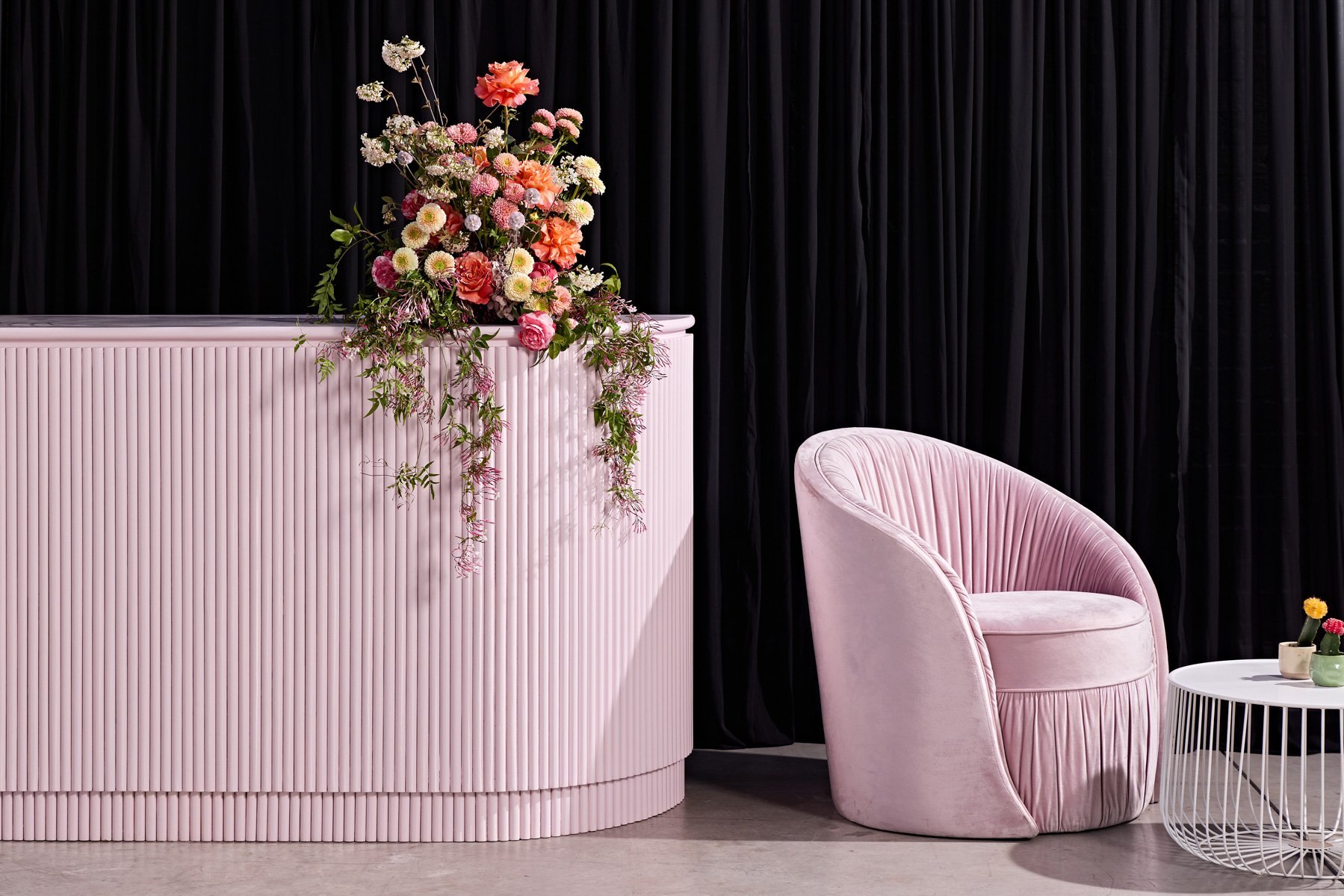 bar setting with ivy bar light pink and monika blush armchair