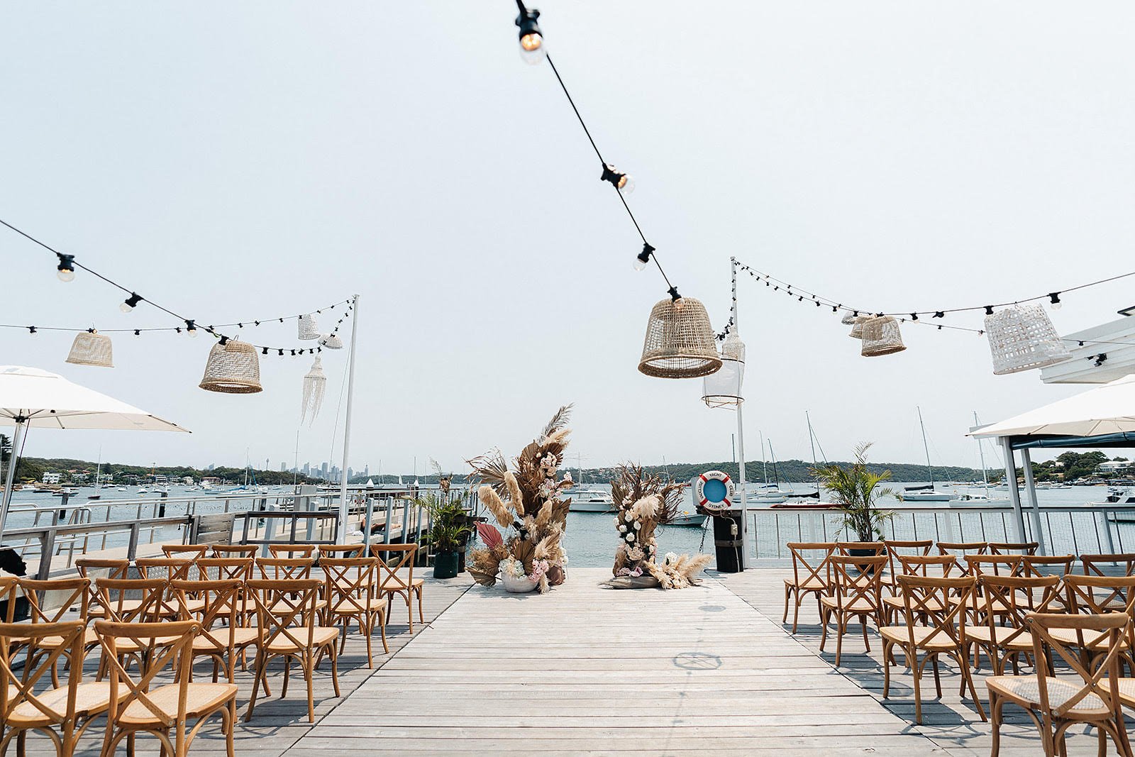 Festoon lighting with Rattan cage pendant (in use).jpg