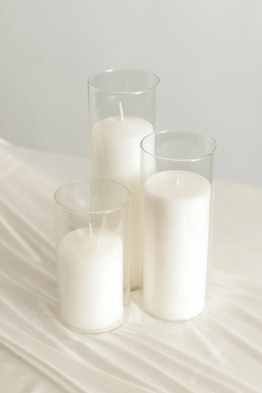 Glass pillar candle holders