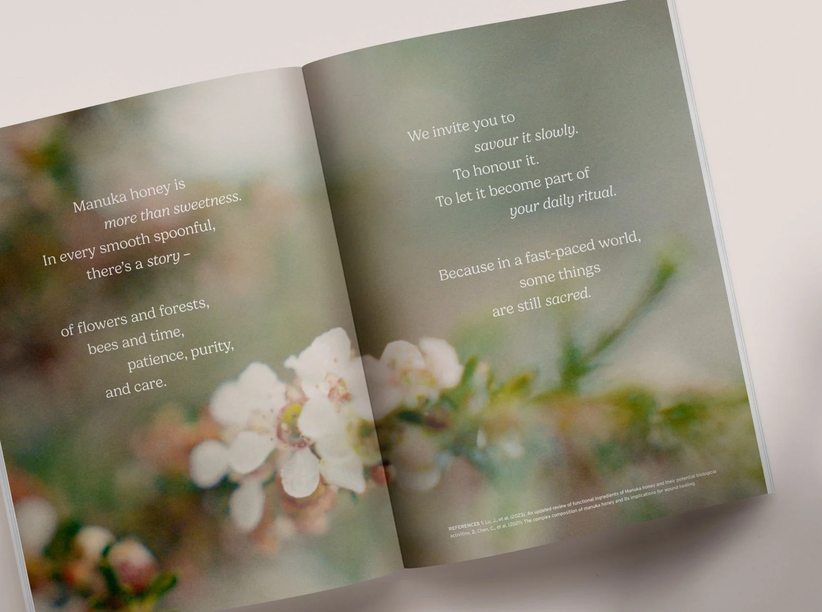 A modern wooden house with large glass windows, set against a mountainous landscape with grassy terrain and a cloudy sky.