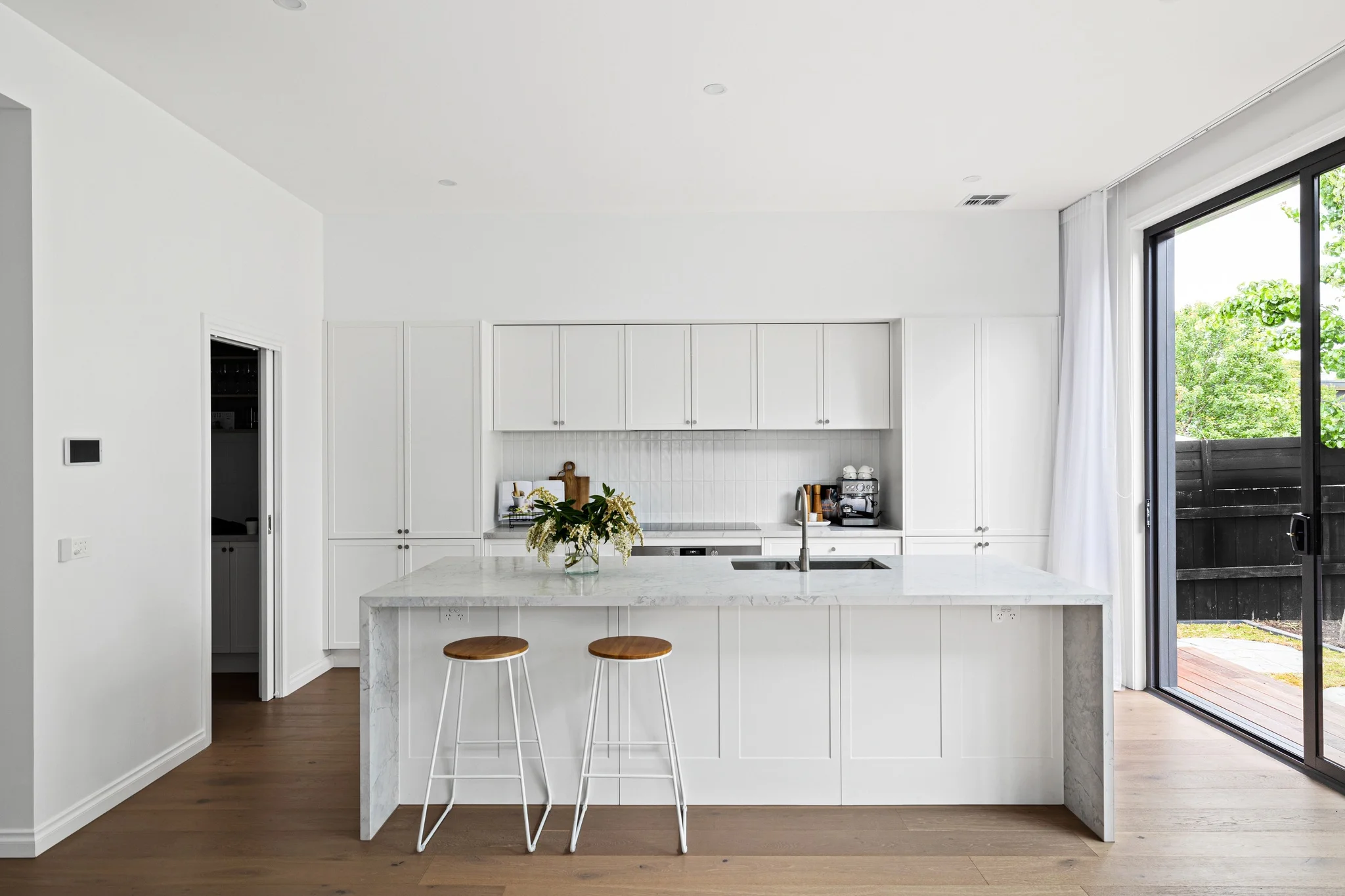 Modern residential kitchen in Watsonia by Dean McCredden Architect.