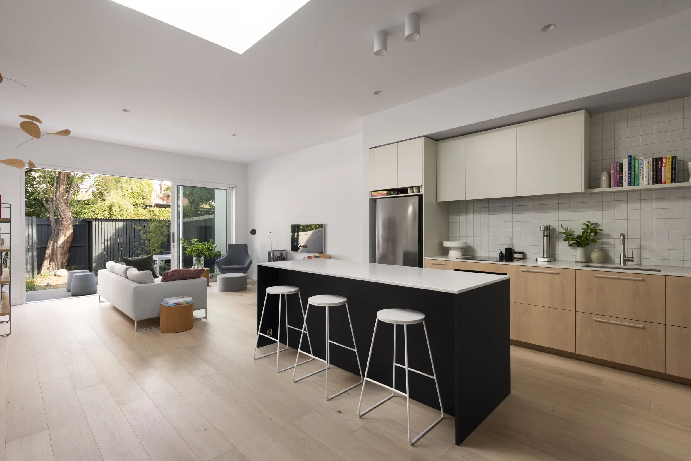 Modern residential Kitchen and Lounge in Carlton North by Dean McCredden Architect.