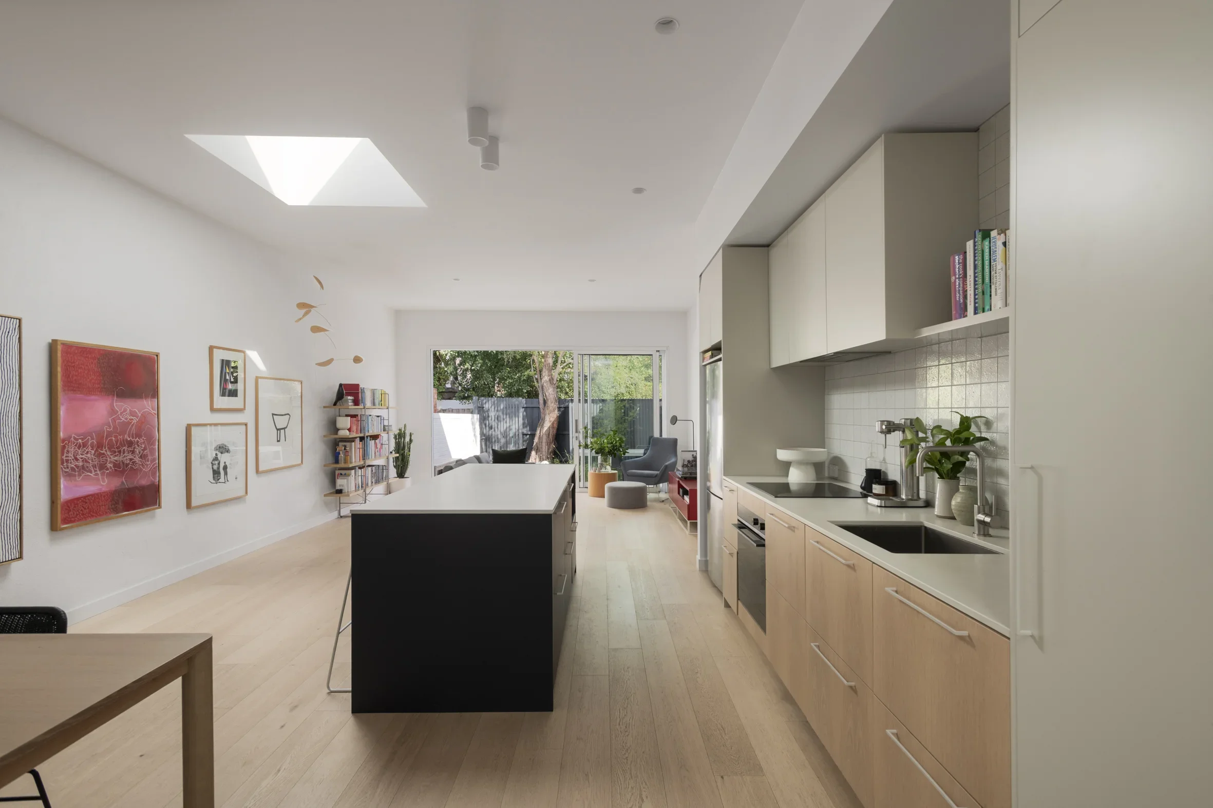 Modern residential Gallery space in Carlton North by Dean McCredden Architect.