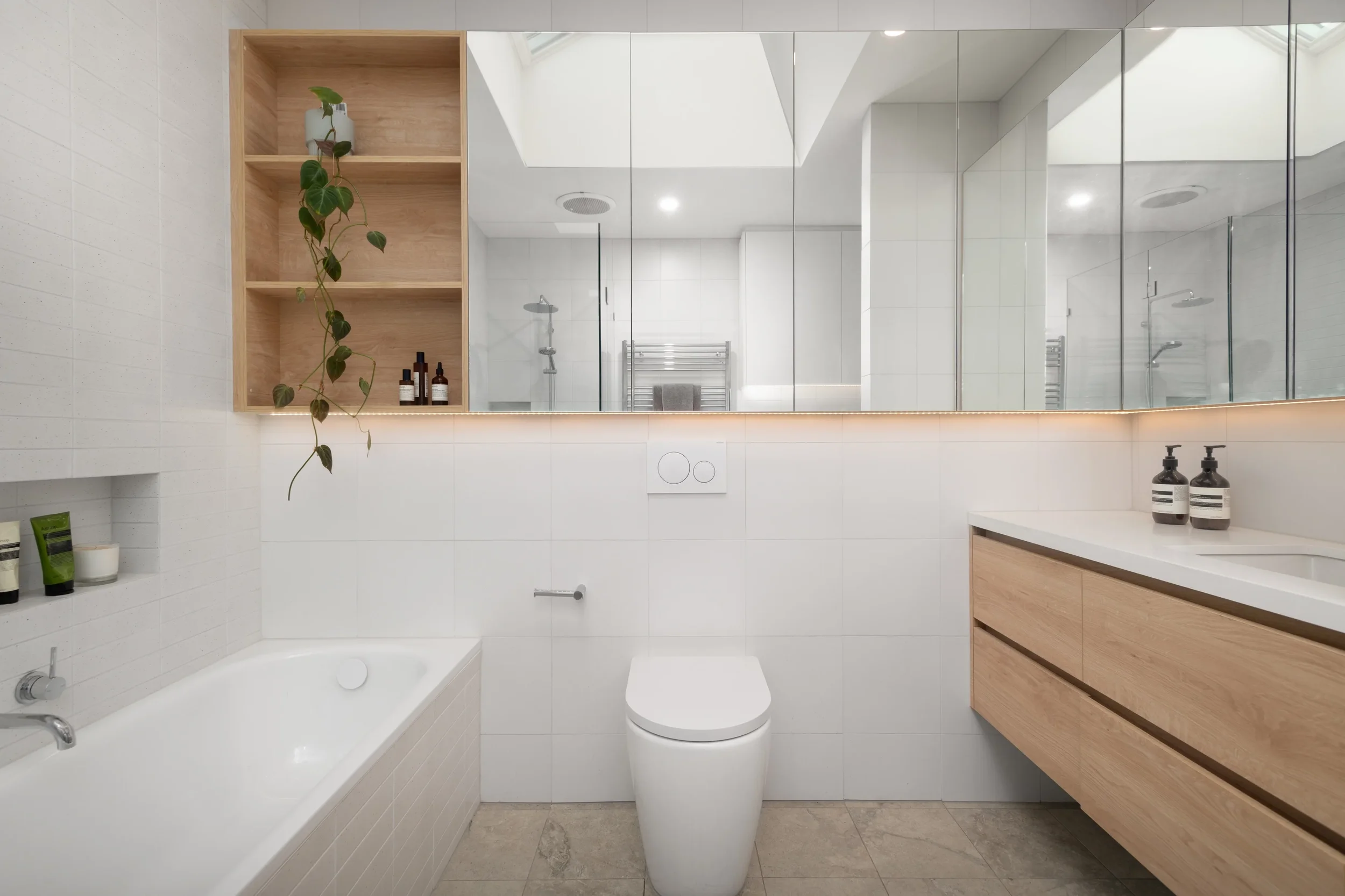 Modern residential bathroom in Fitzroy by Dean McCredden Architect.
