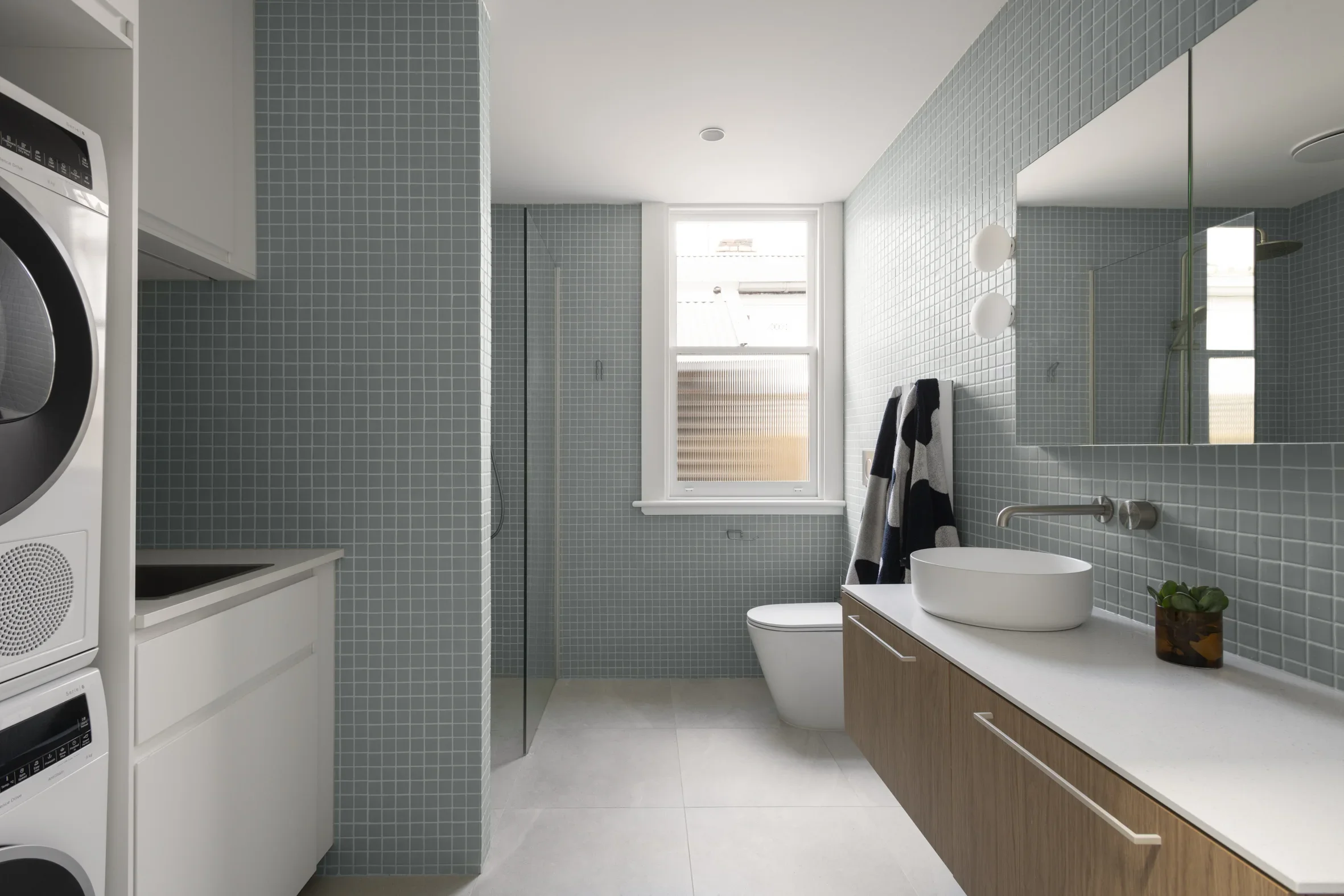 Modern residential Bathroom in Carlton North by Dean McCredden Architect.