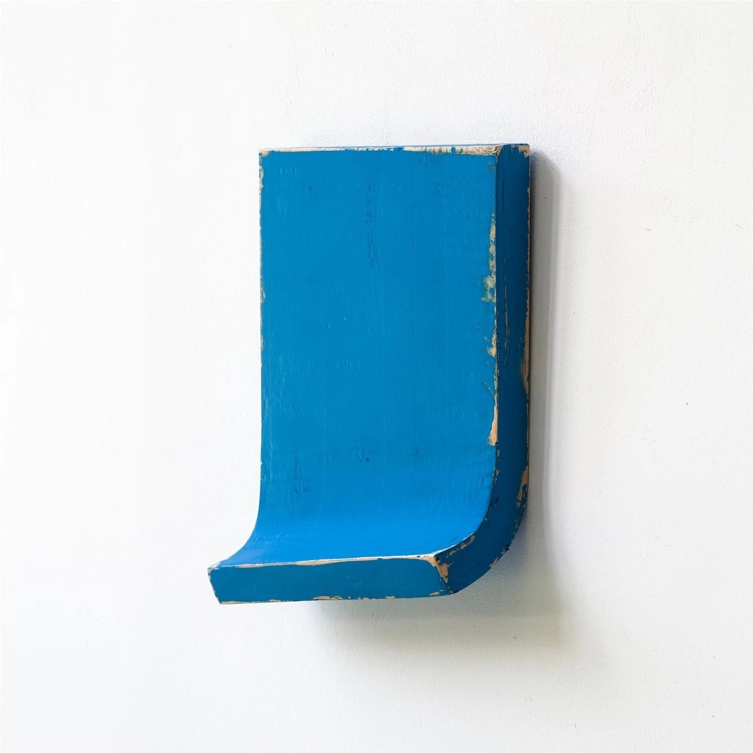 SOLD

Blue distressed wall art against a white wall.
