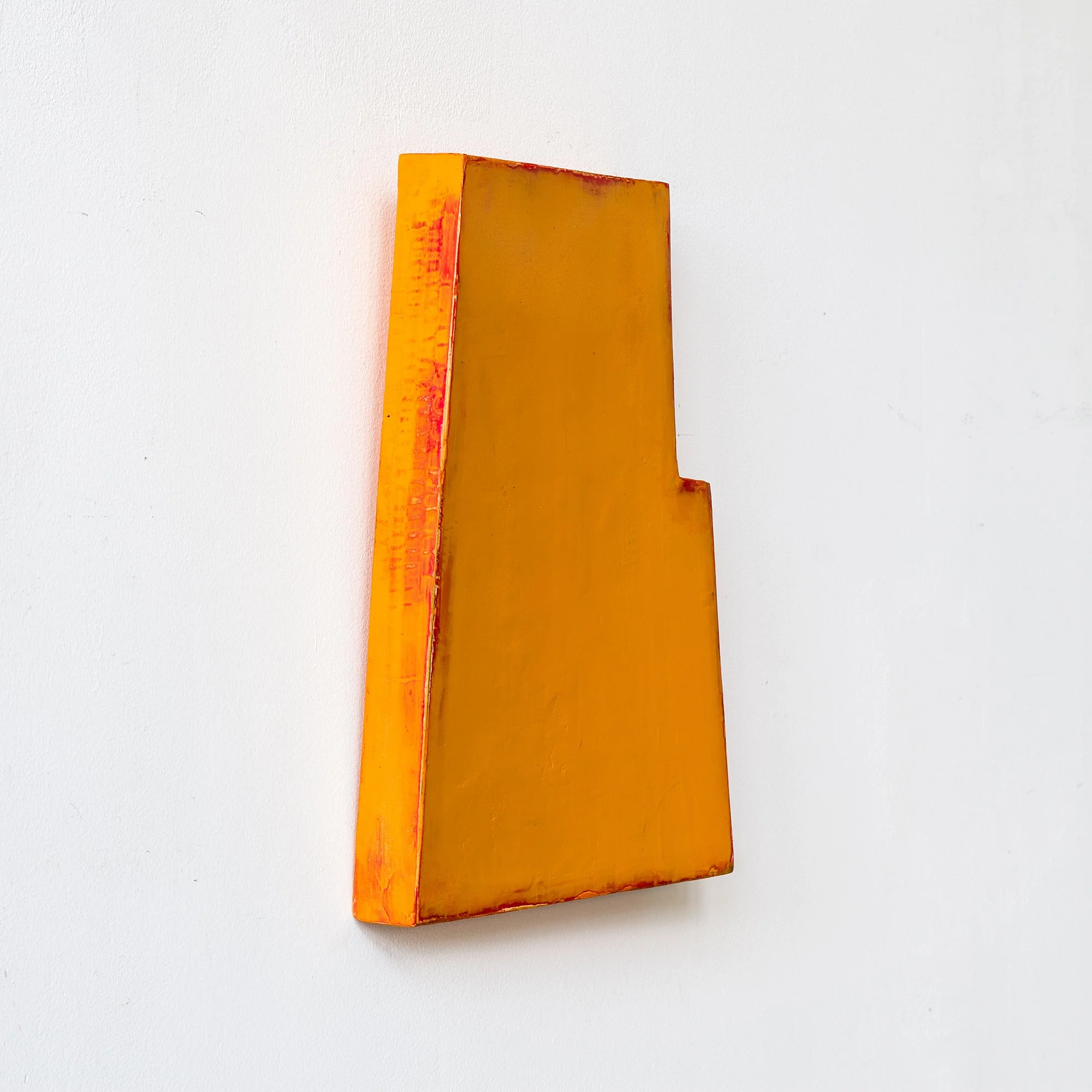 SOLD

Abstract orange geometric sculpture mounted on a white wall.
