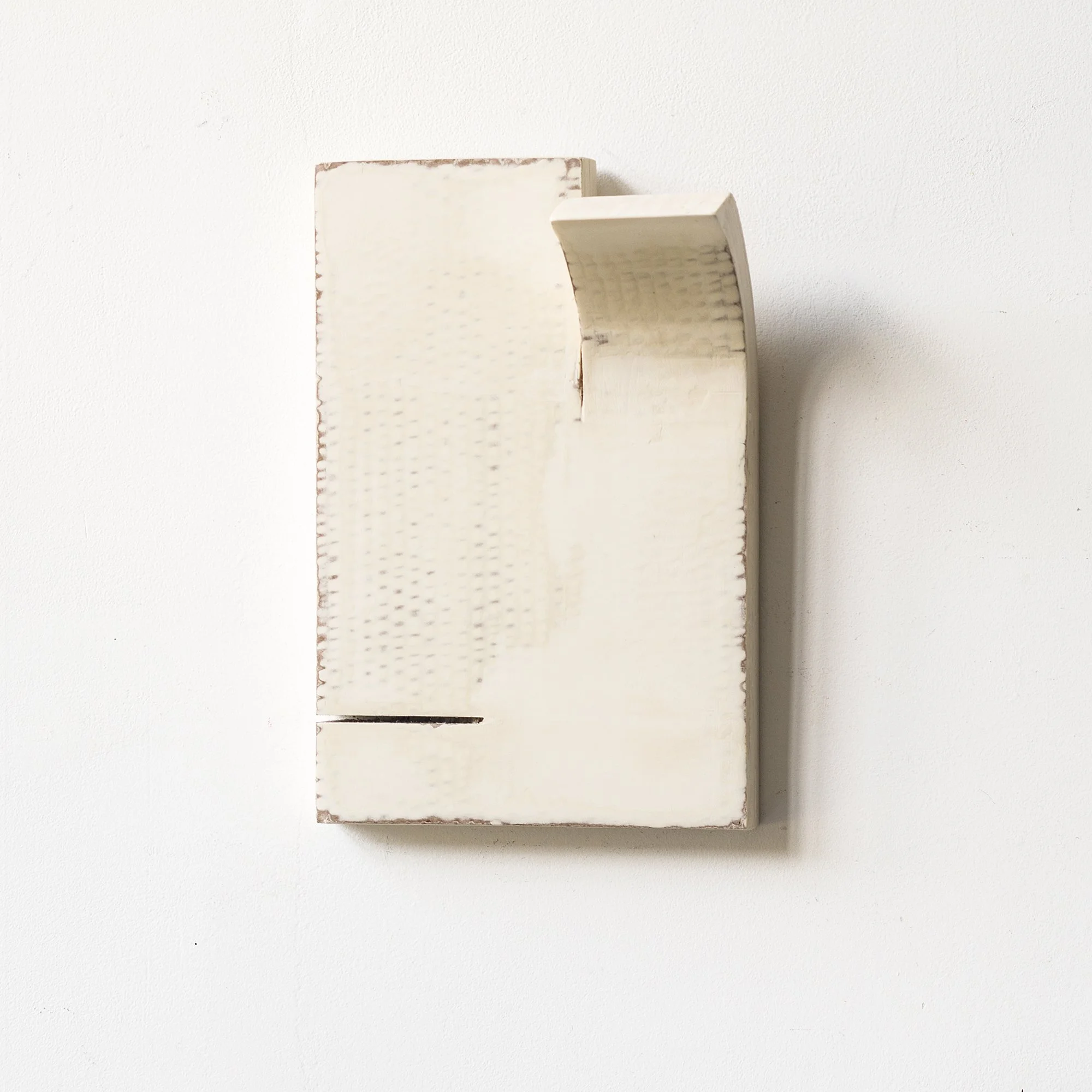 SOLD

Bring depth and dimension to your space with this original 3D wall sculpture crafted from cardboard. Featuring a sleek, minimalist design with textured cream tones and a geometric curve detail, this piece blends modern aesthetics with sustainab
