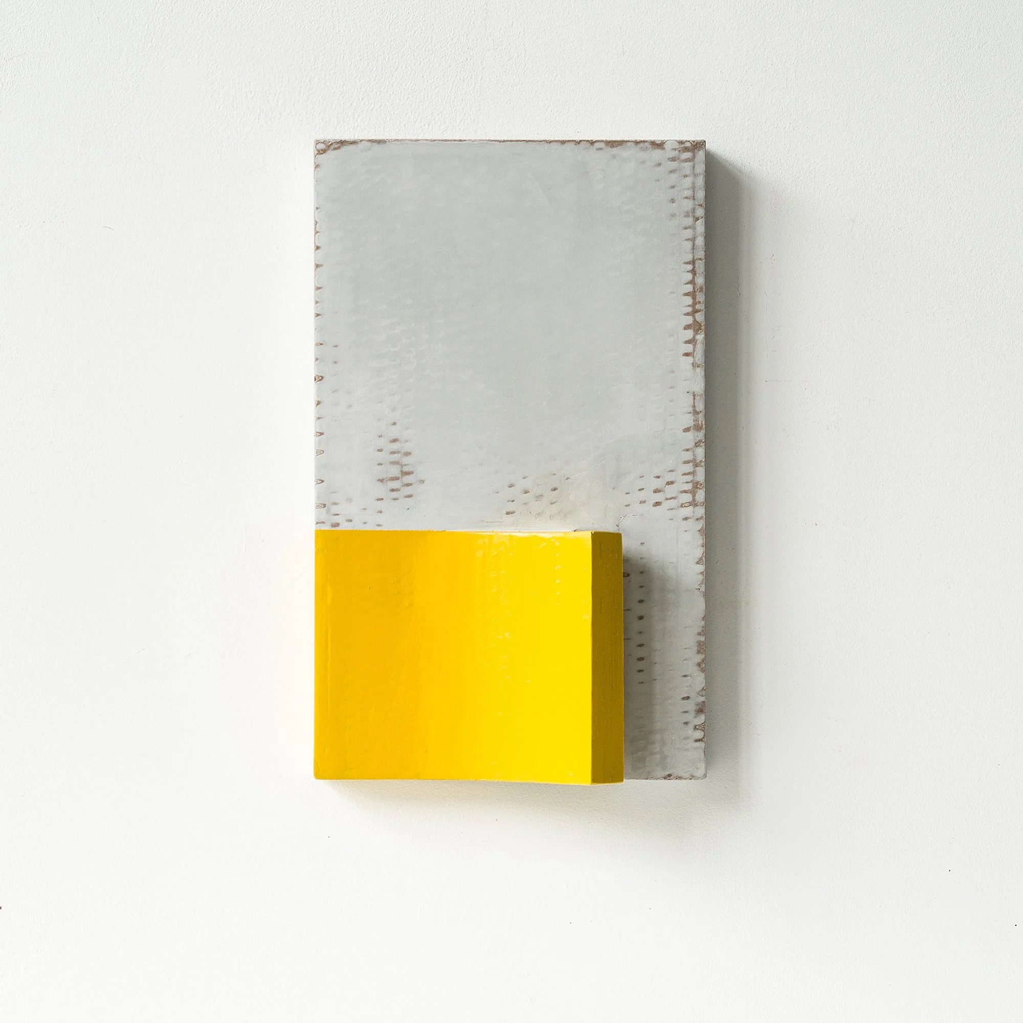 Gray Minimalist Wall Sculpture with Yellow Block