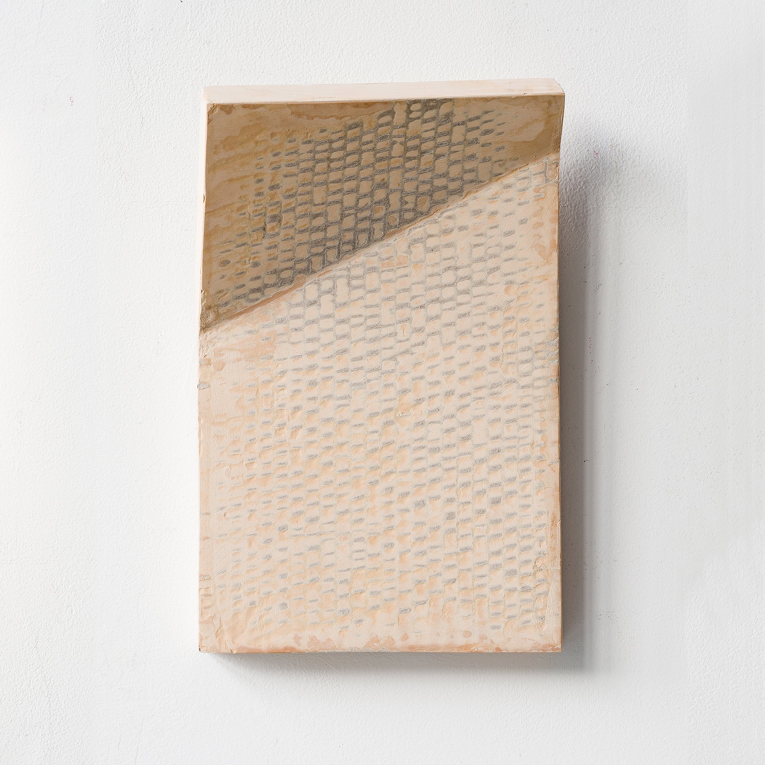SOLD

Abstract cardboard artwork with a textured, raised surface and geometric pattern