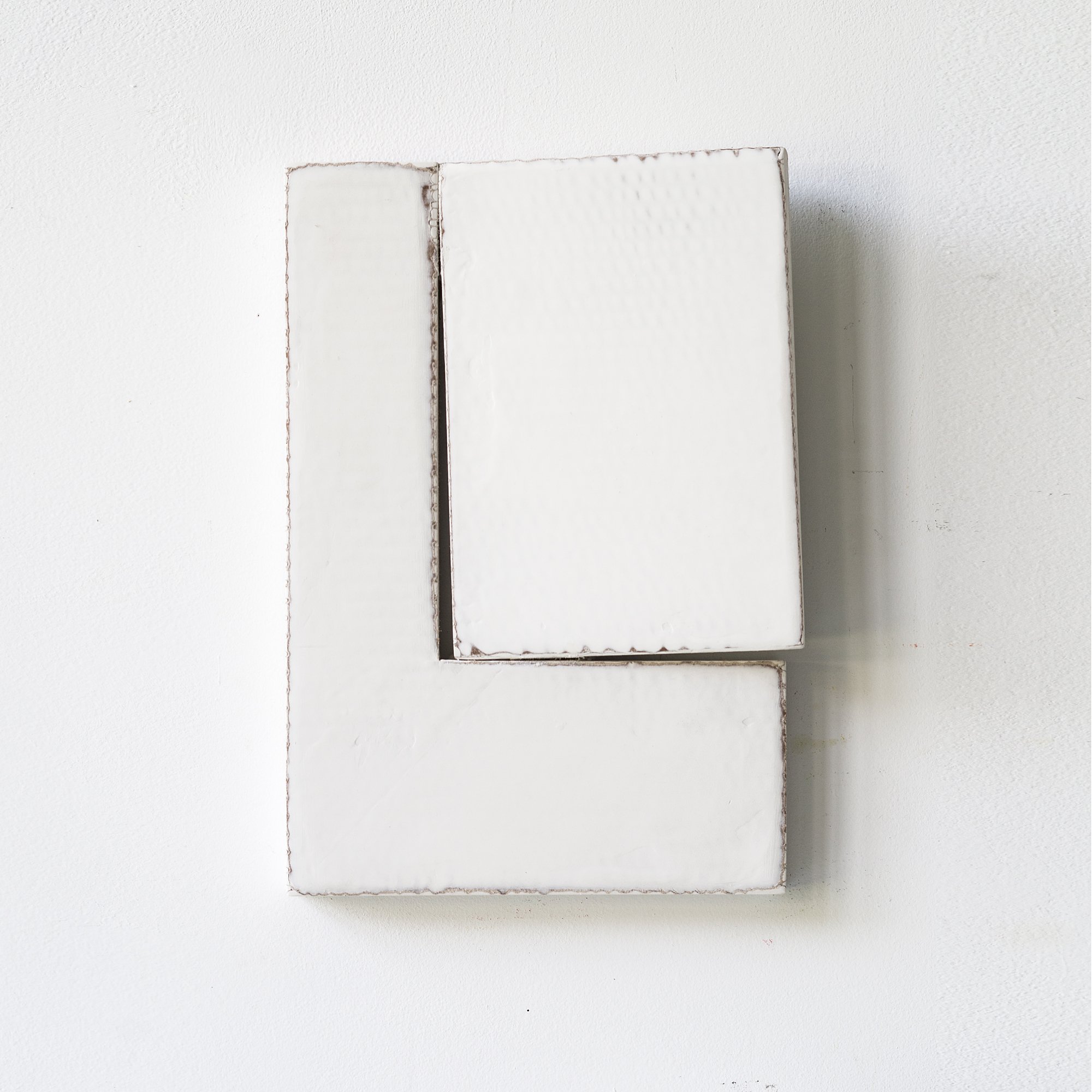 SOLD

Geometric white wall sculpture with two overlapping rectangular shapes.