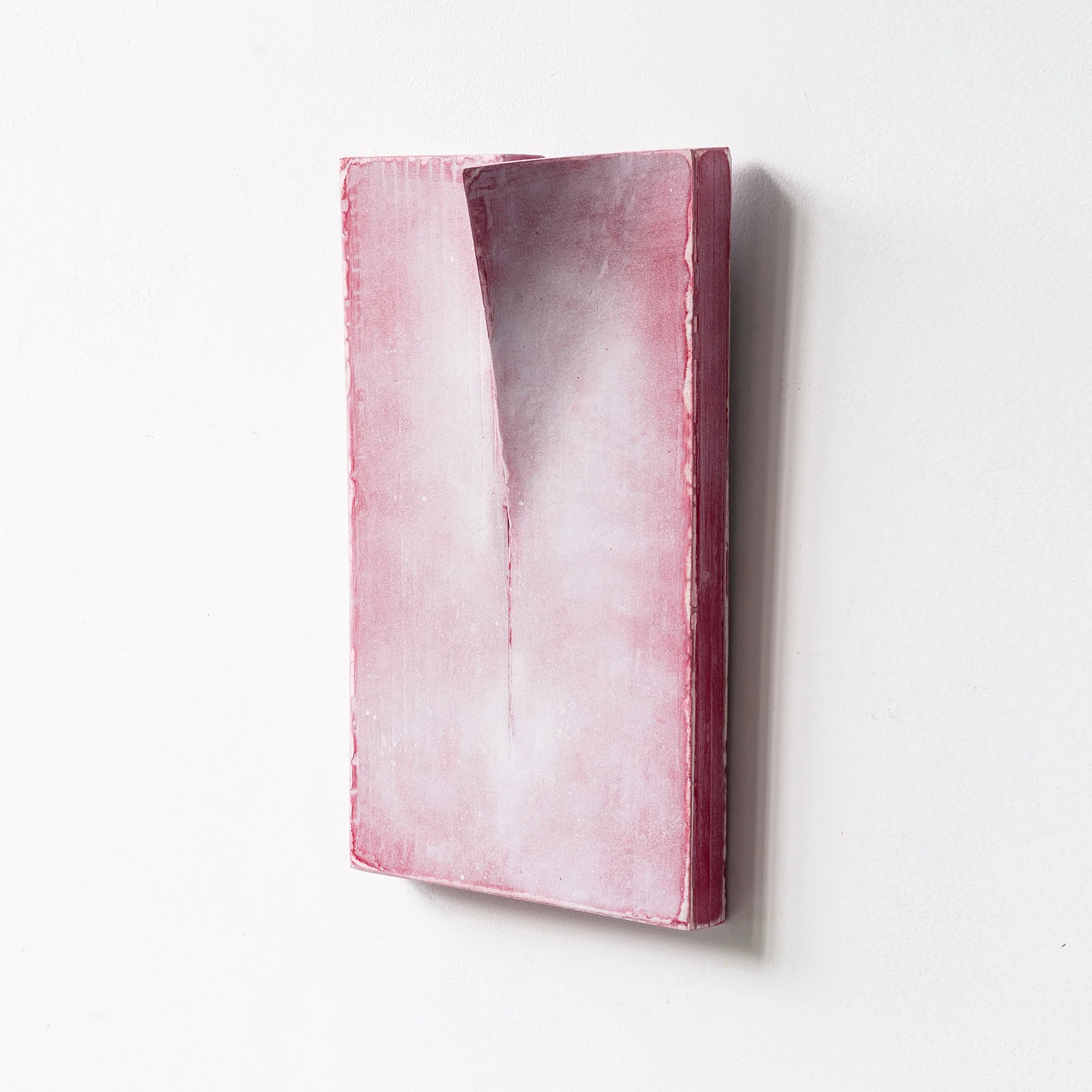 SOLD

Red and white abstract artwork on a wall with a vertical slit, creating a three-dimensional effect.