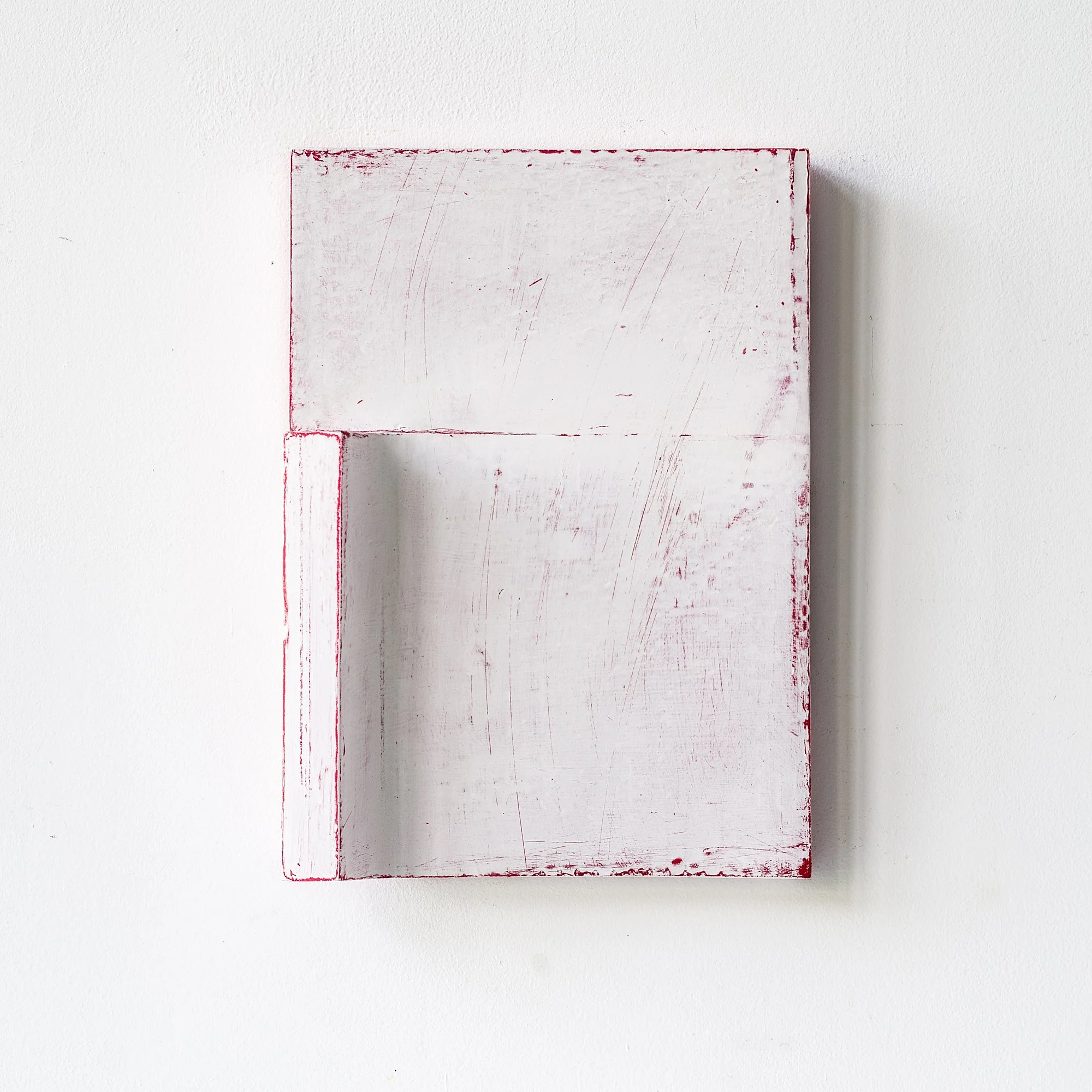 SOLD

Abstract wall art with red outlines and a textured white surface