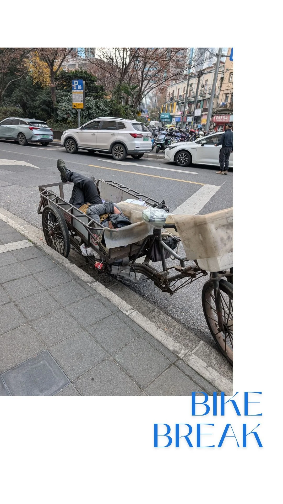 Makeshift break in the back of a bike. There's time to relax even in one of the world's busiest cities.