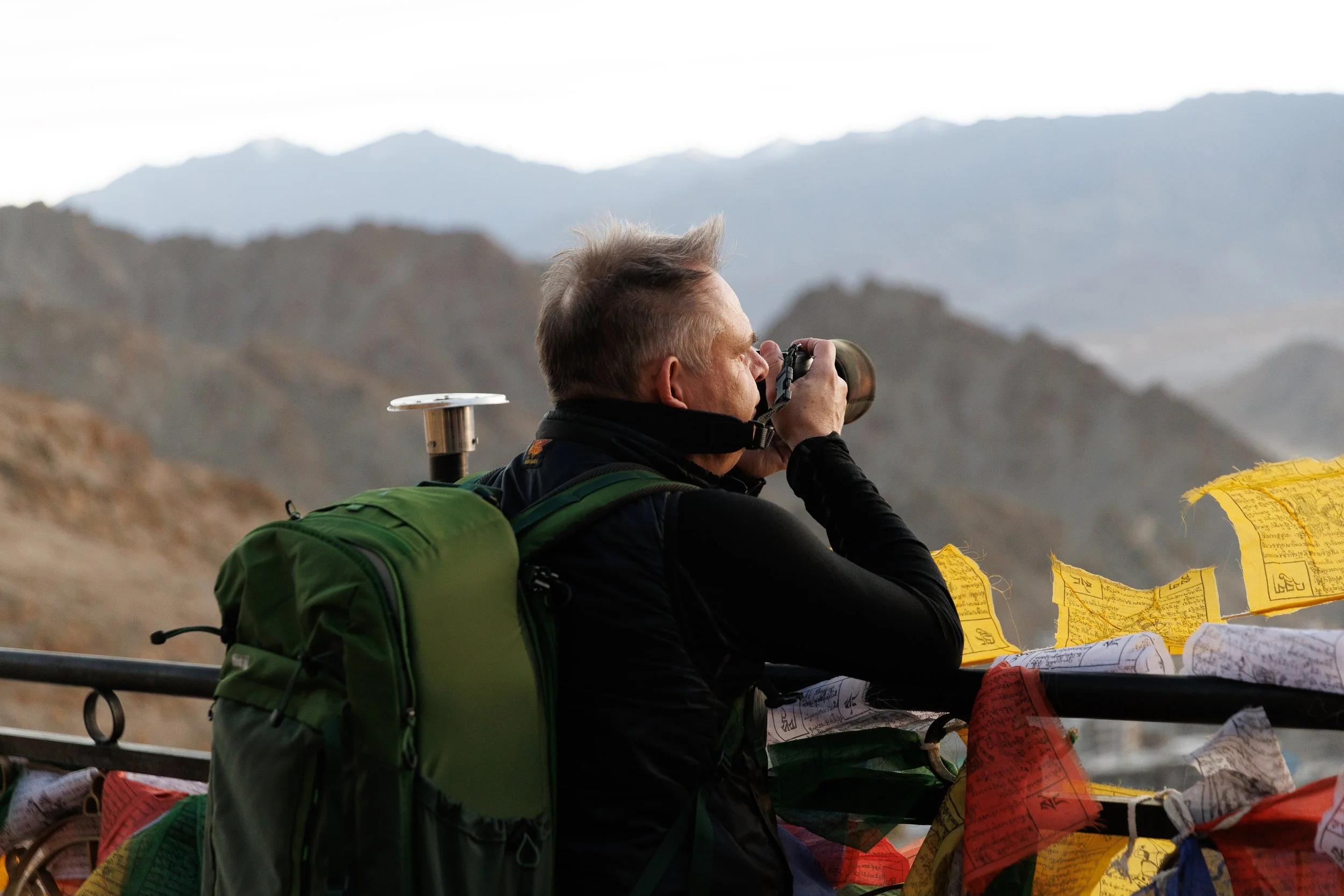 People trekking in the mountains. Snow leopard photography tour Ladakh