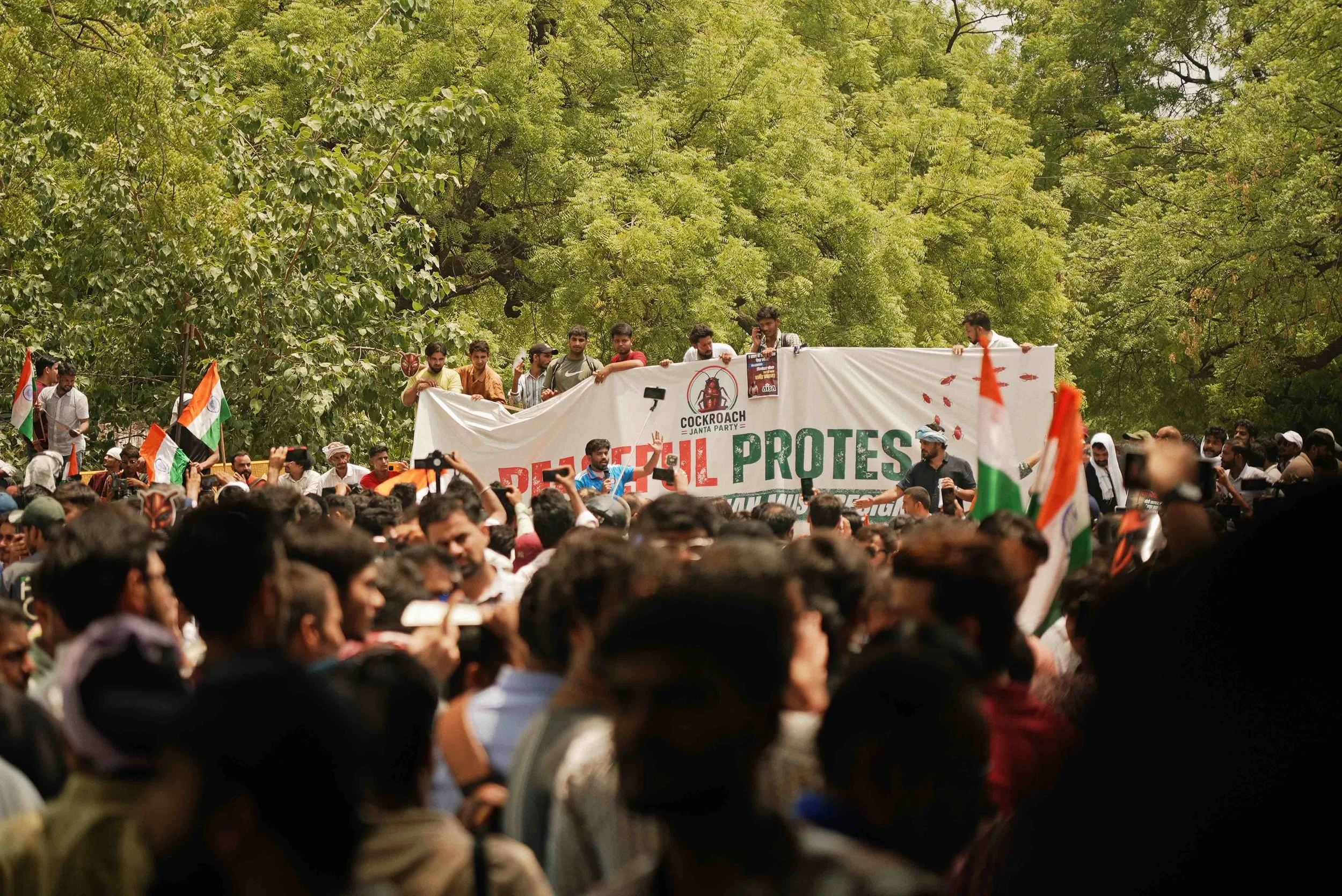 Photo Feature: Masks, Placards and Anger at the Cockroach Janta Party Protest