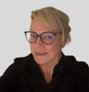 blonde woman wearing glasses