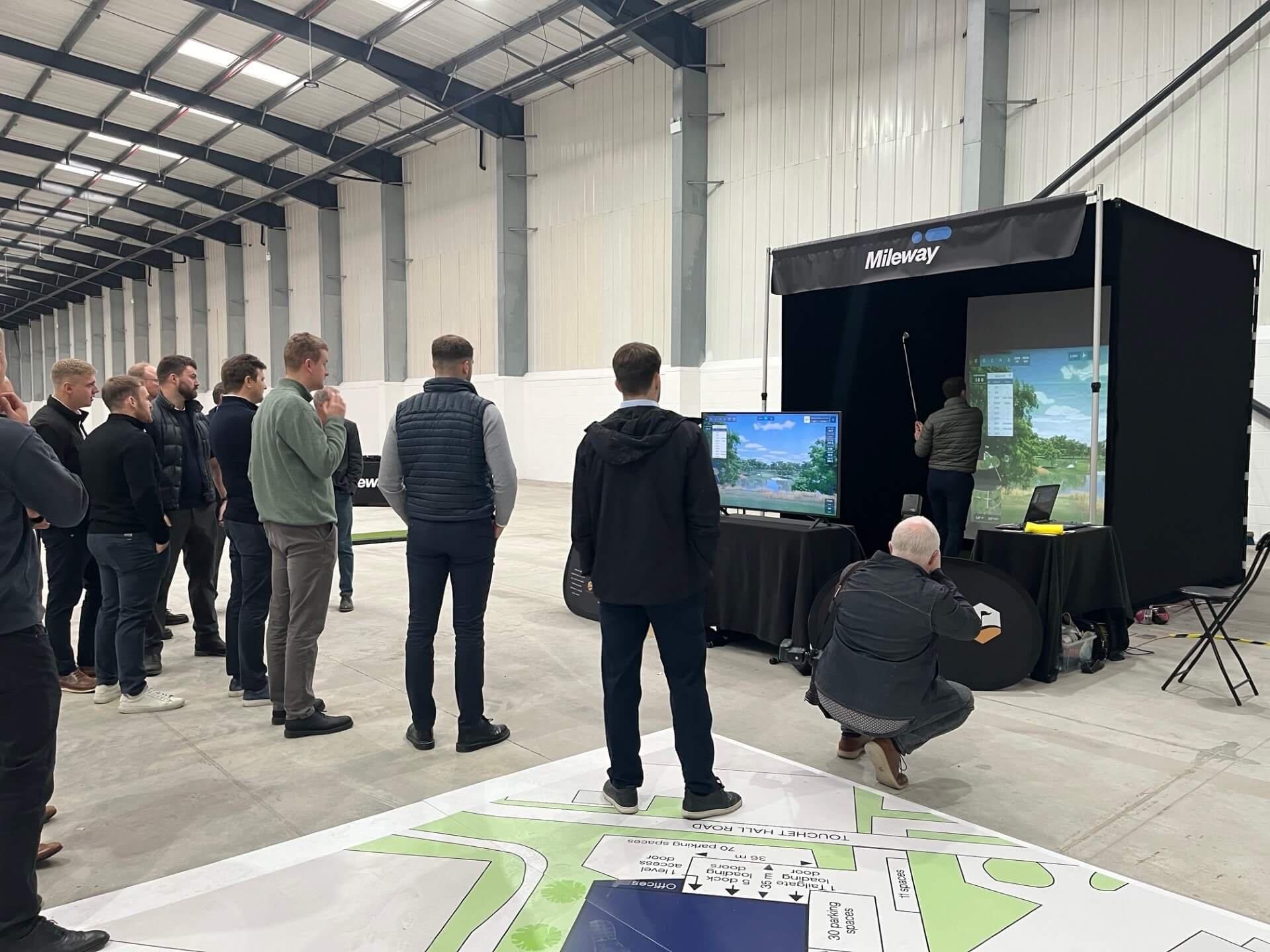Warehouse relaunch with golf simulator hire for estate agents.