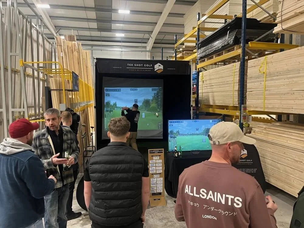 Branch opening with golf simulator activity for guests.