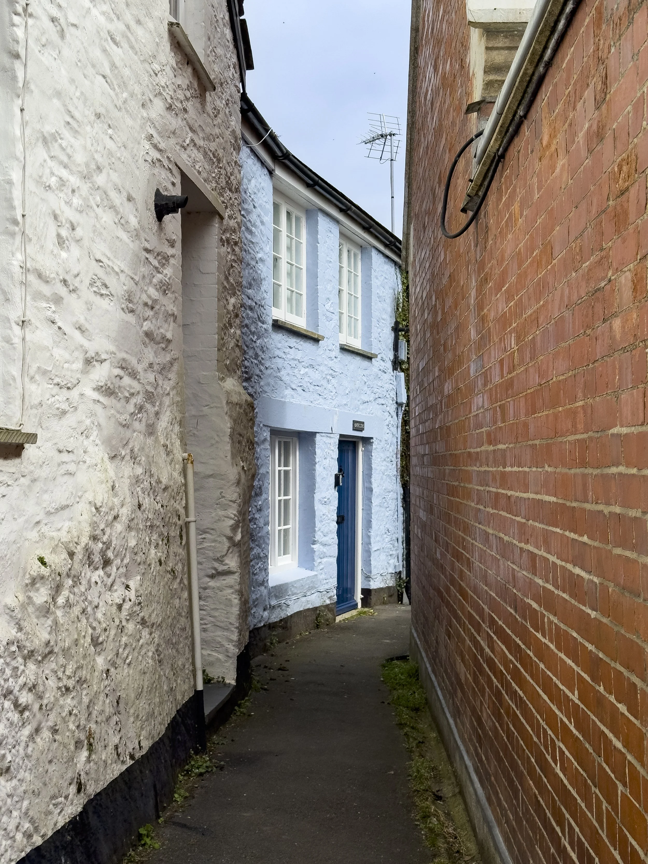 Blue House in an Alleyway