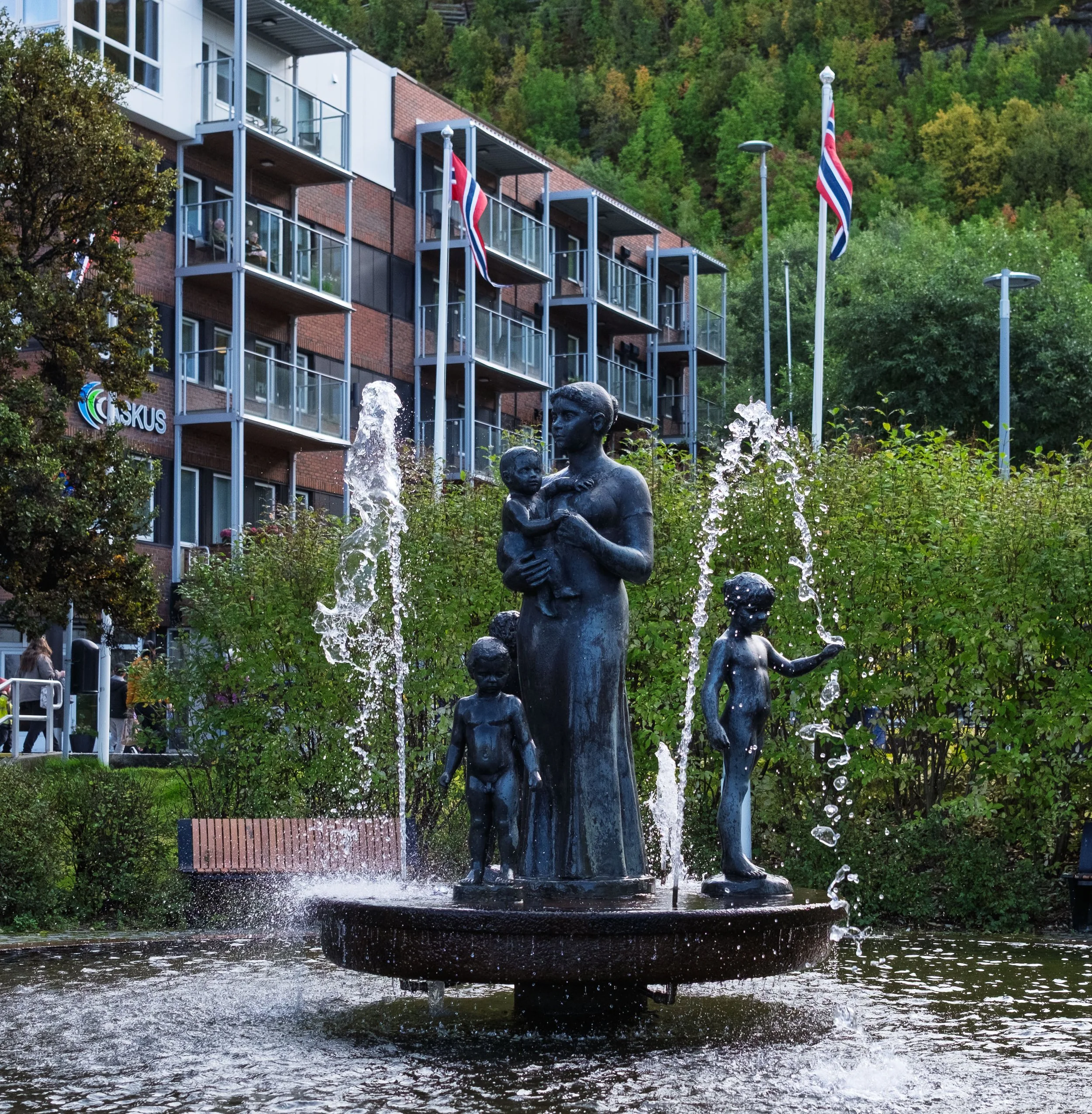 Woman and Baby Sculpture Next to City Hall