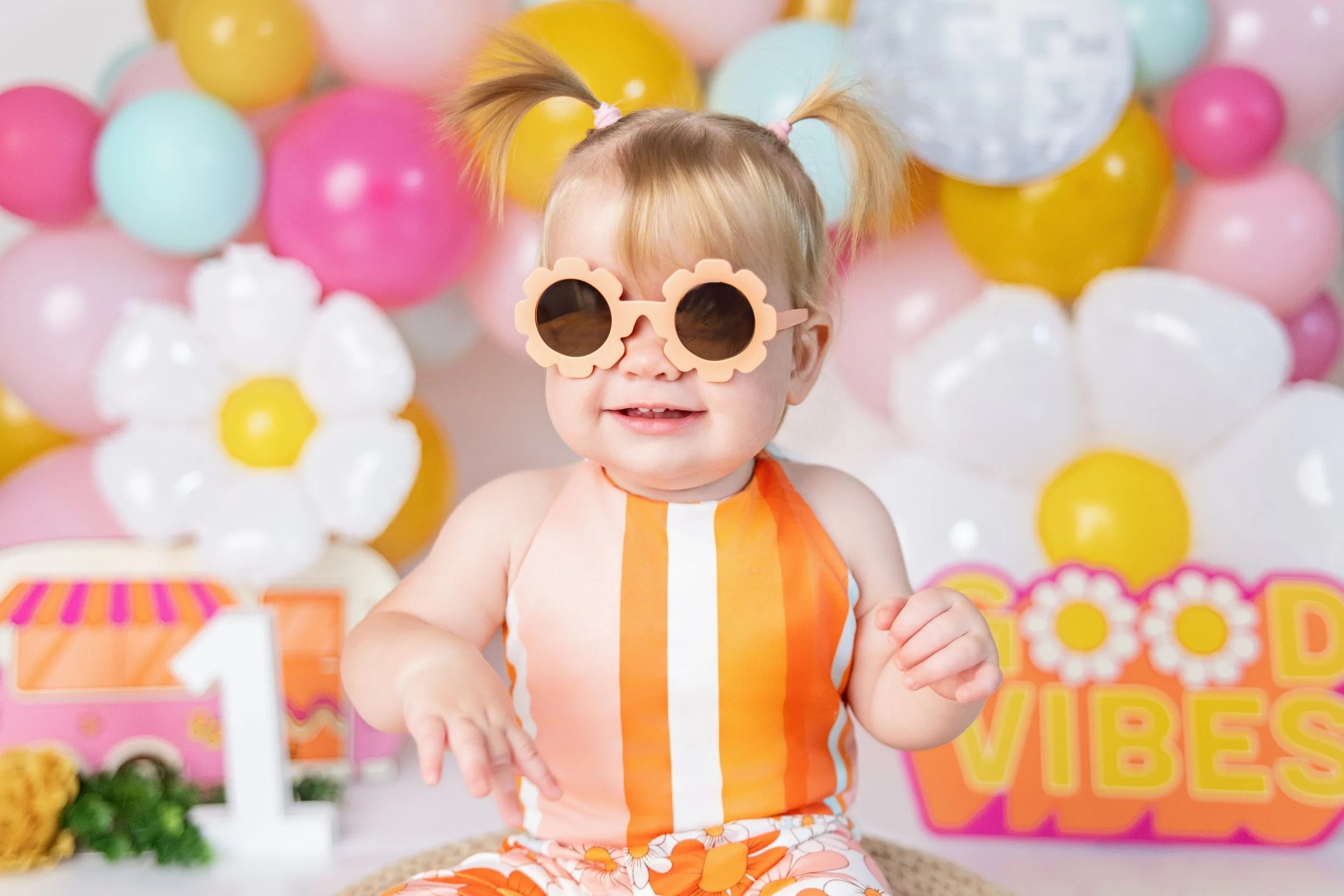 One year cake smash milestone photography session in a Rochester Hills baby photography studio