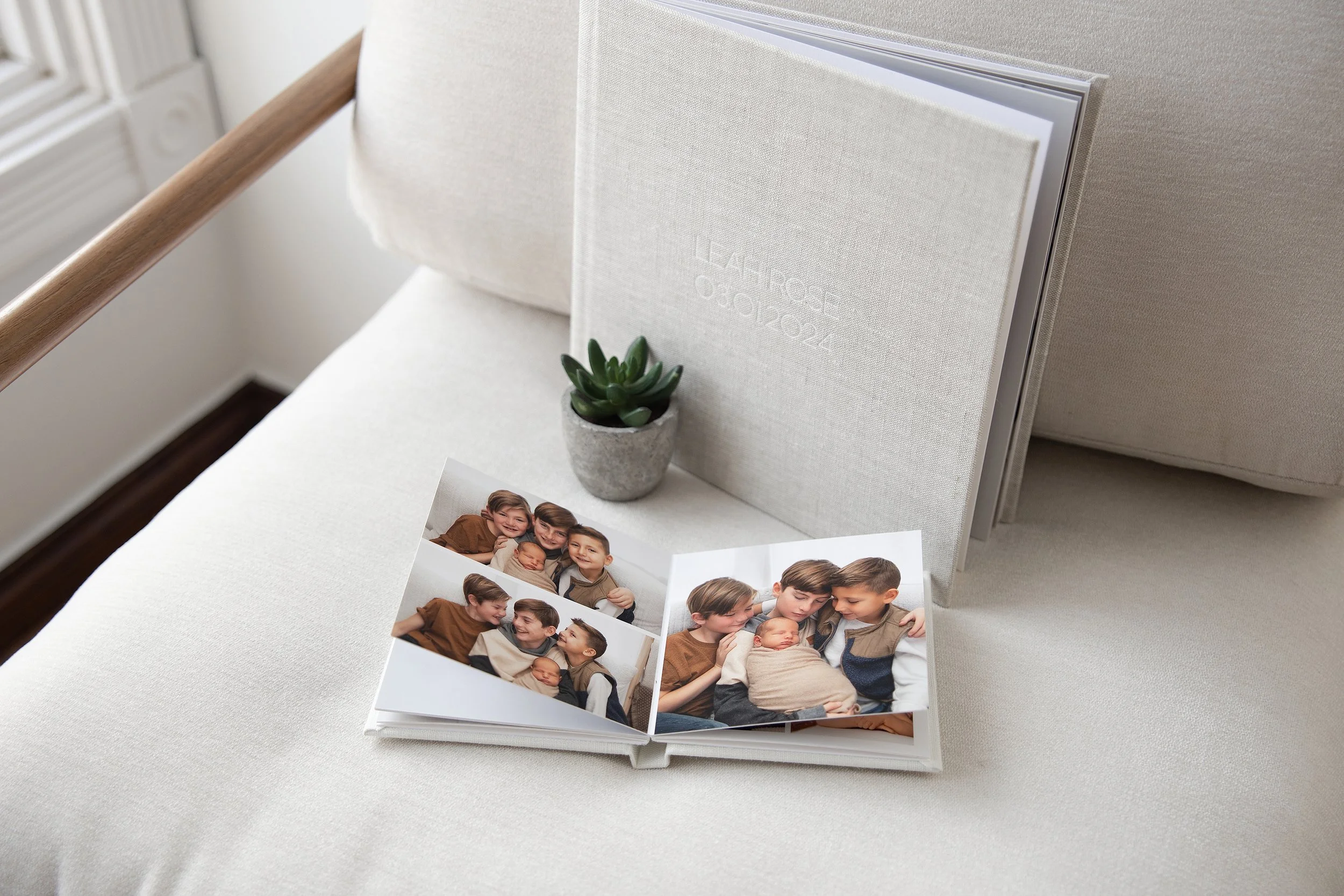 Heirloom newborn photography album and printed images from a Rochester Hills newborn photography session by El & Em Photography