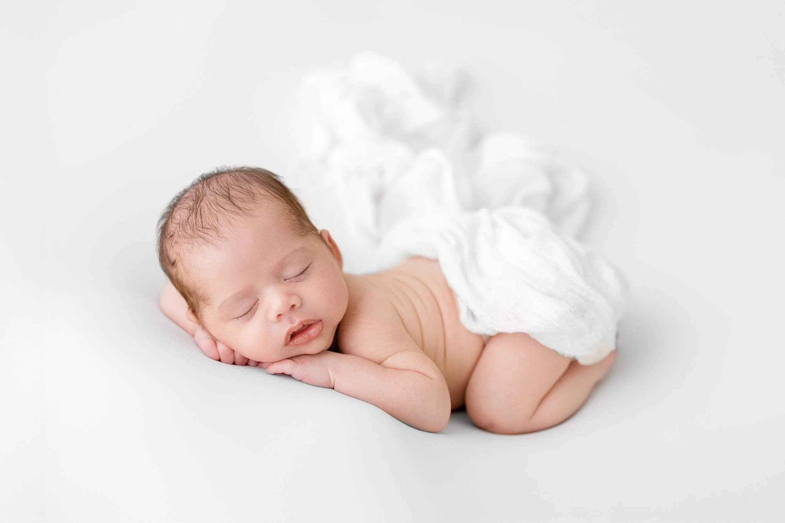 rochester-hills-newborn-photographer-sleeping-baby-white-wrap.jpg