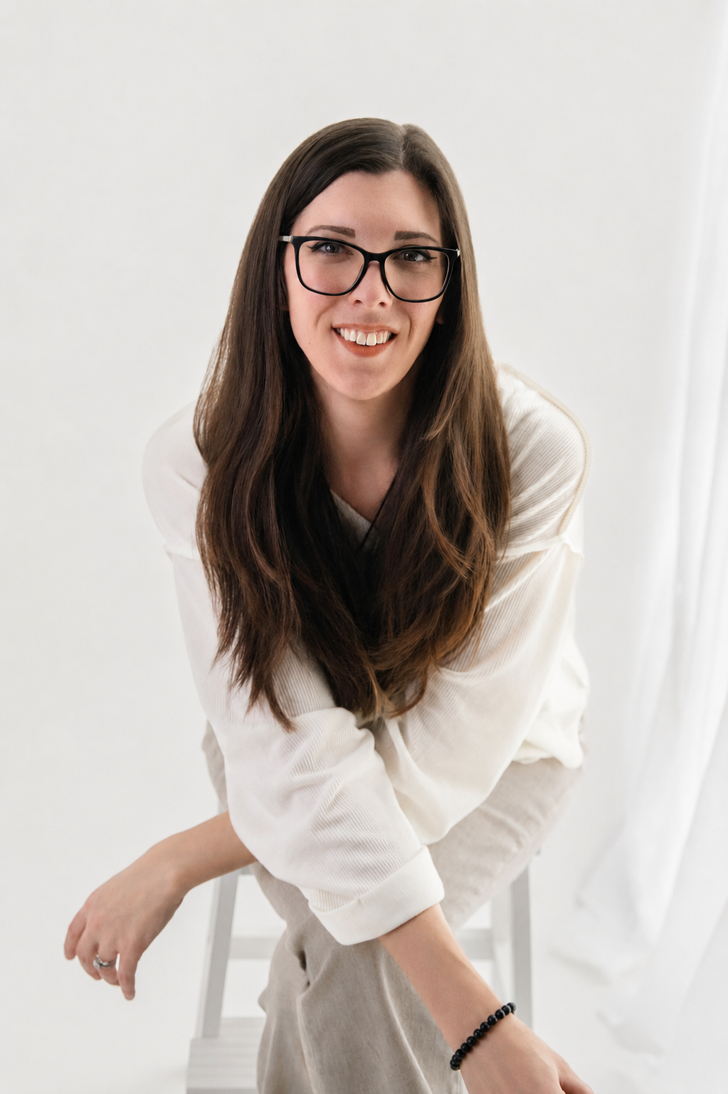 Personal branding portrait of Kate Motherwell, photographed by El & Em Photography in a bright natural light studio in Madison Heights, Michigan.