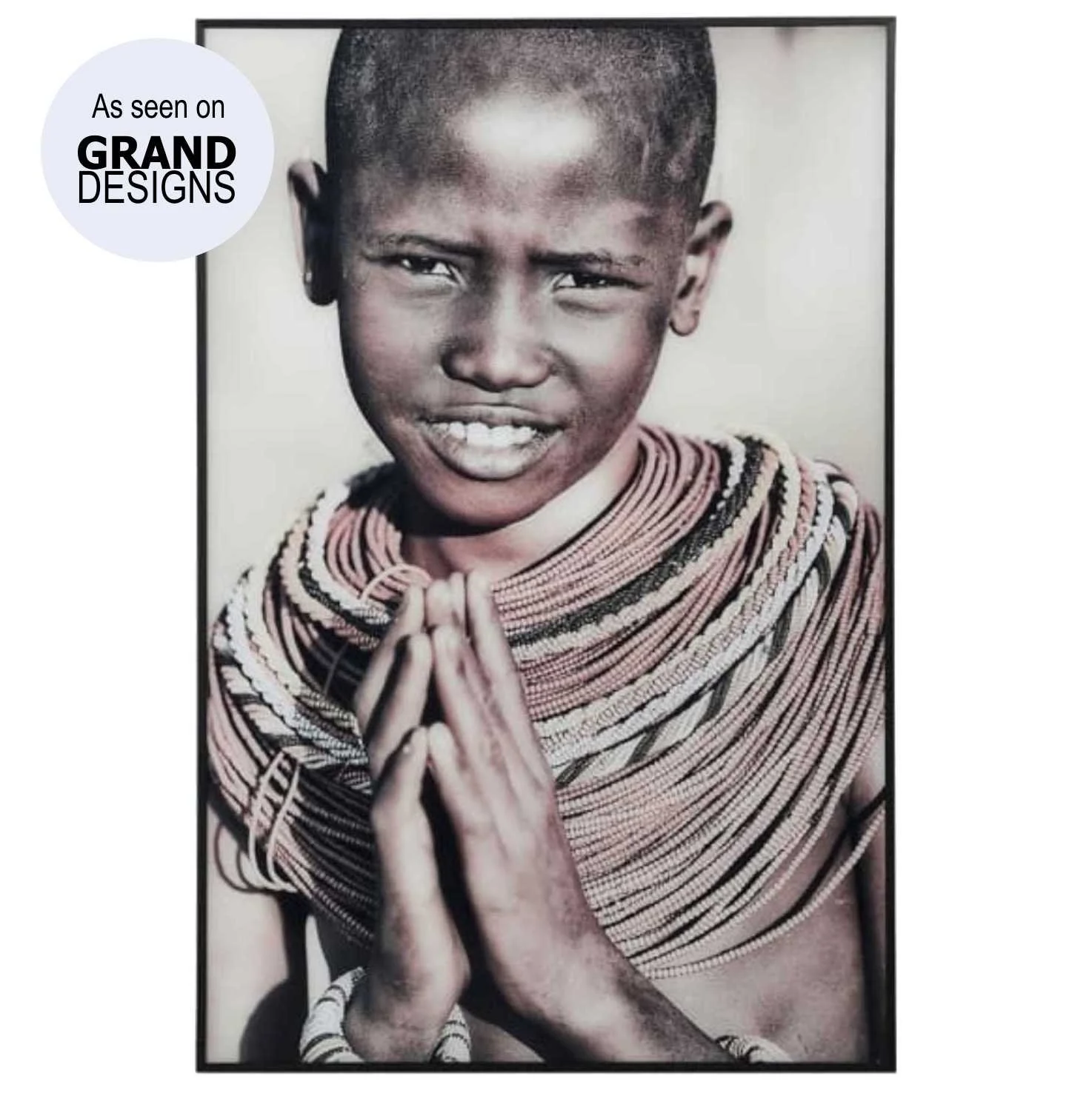 framed print of young Indian boy in tribal regalia