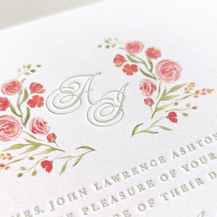Sneak peek of a monogram in a wedding invitation I created for a couple that wanted the elegant look and textured feel letterpress but also wanted to incorporate bright watercolor floral elements. Combining letterpress and full-color flat printing re