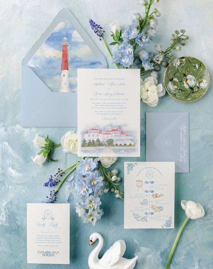 This custom wedding invitation suite features a watercolor venue, watercolor illustrations that correspond with the wedding events, and floral elements. The wedding venue and the lighthouse landmark are a significant part of the couple&rsquo;s love s