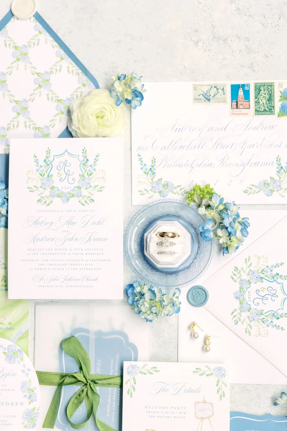 blue monogram crest watercolor wedding invitation