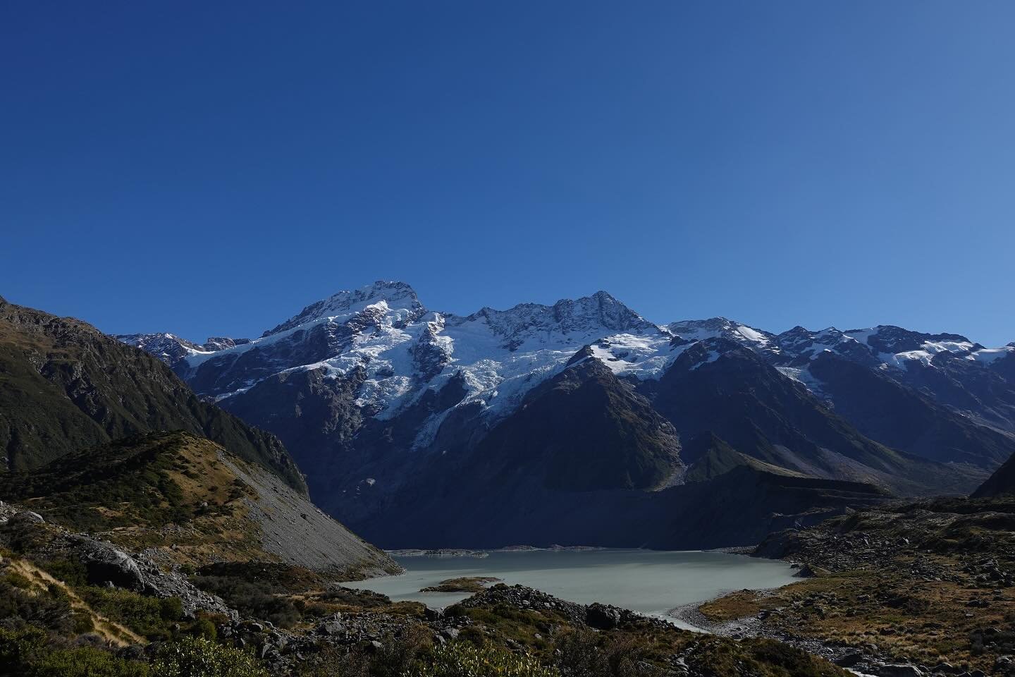 Hooker Valley Track takes you through the Southern Alps. You cross swing bridges, see snow capped mountains, two glacial lakes, and those amazing NZ views during the entire hike. The trail ends at Hooker Lake where in some seasons you can see iceberg