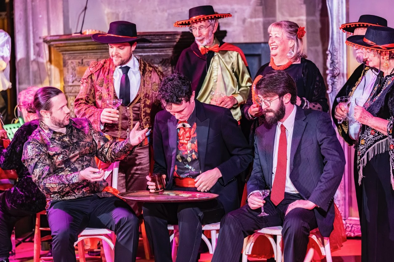 Alfredo and chorus gambling.jpeg