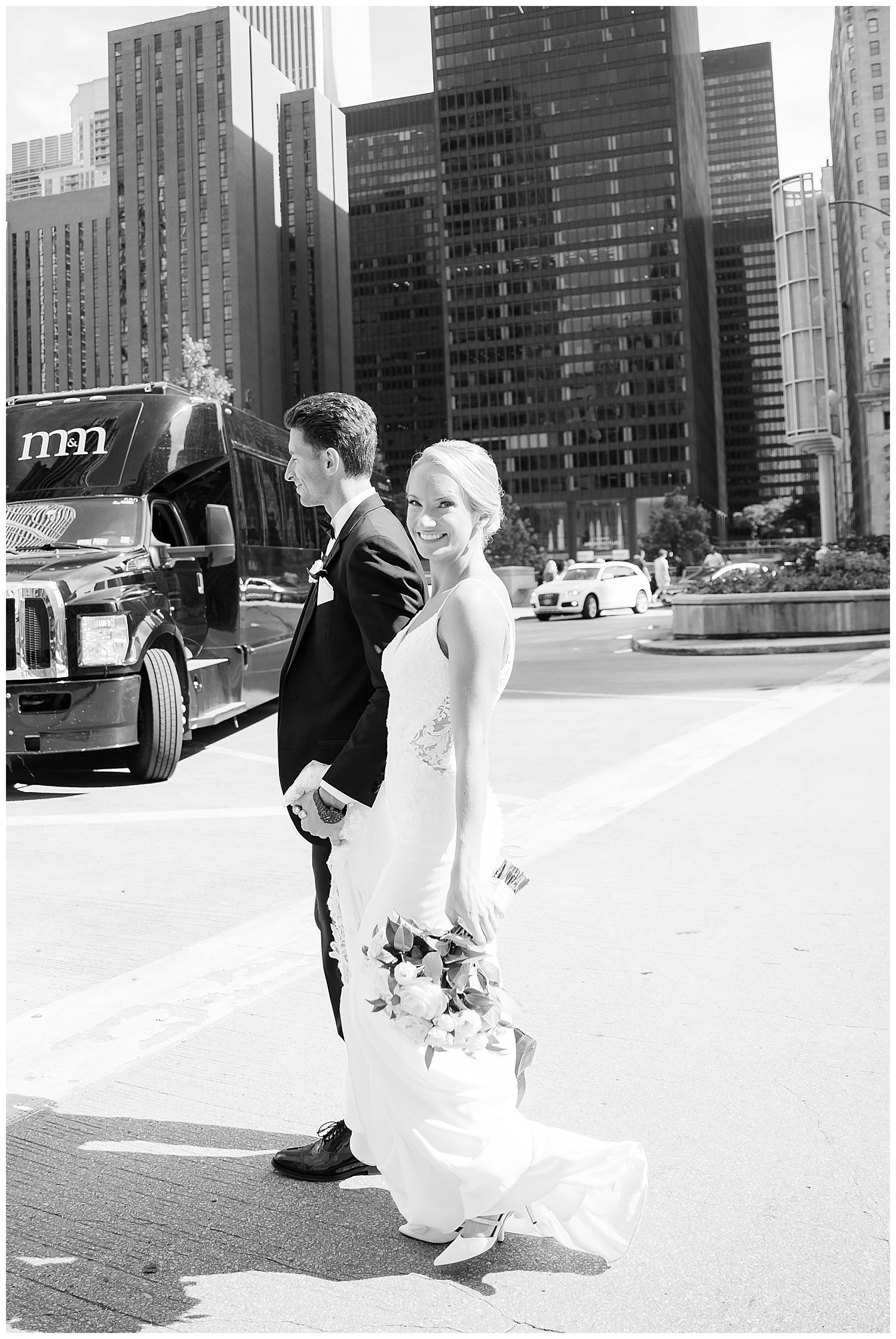 bride and groom on Michigan Avenue in Chicago