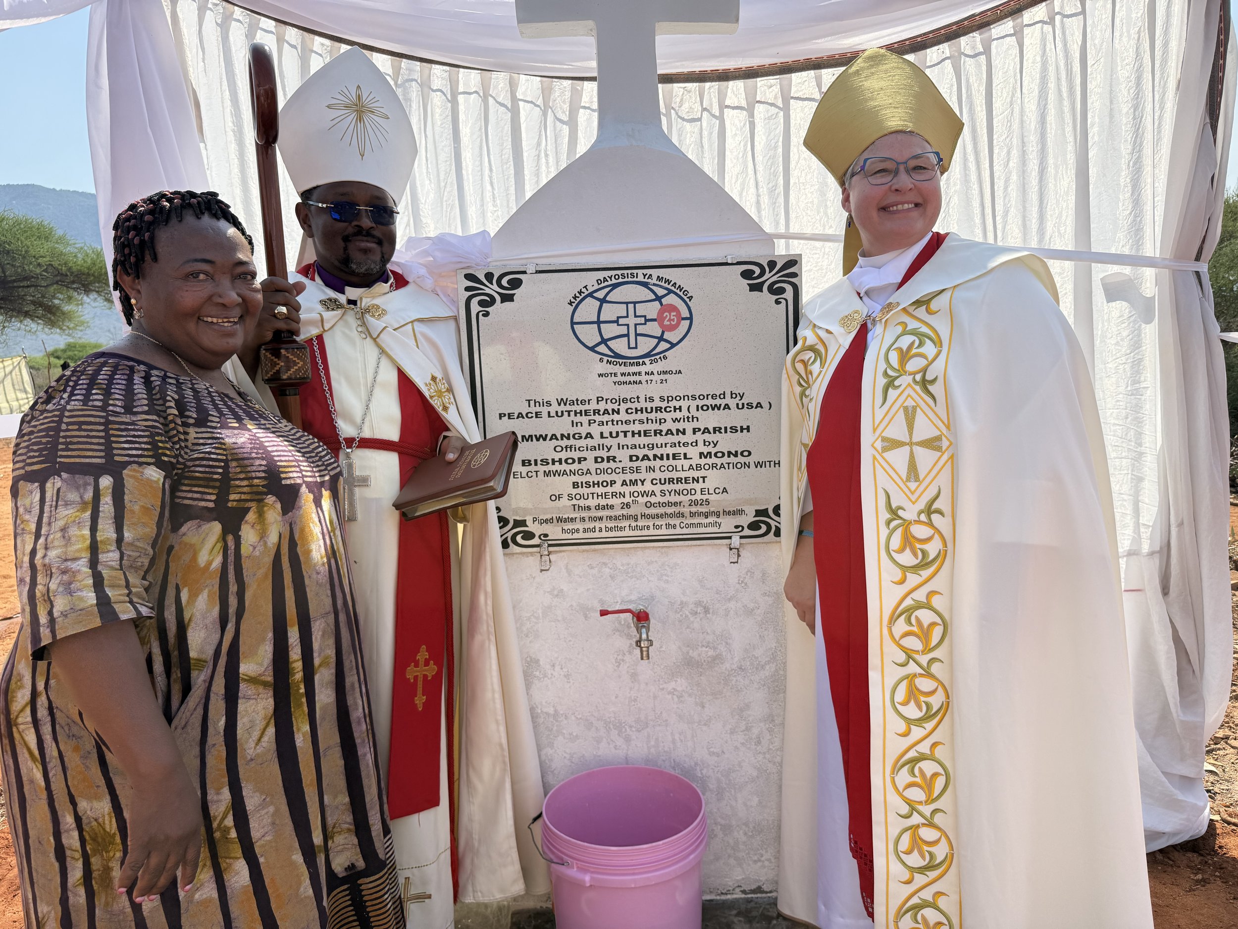Mama Severa Masawe, Bishop Mono, and Bishop Current.