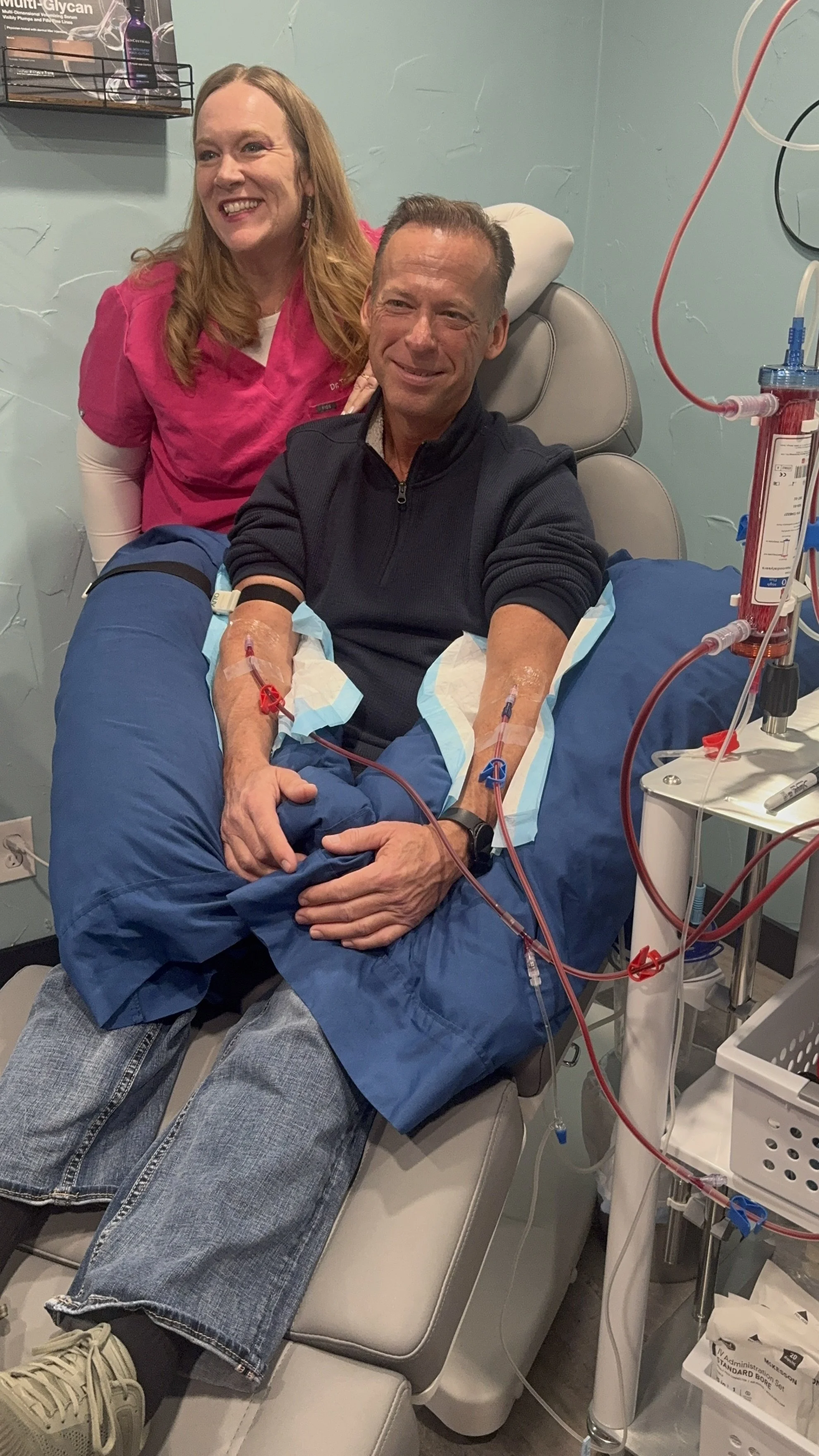 Dr. Lyday and a man receiving treatment at The Lyday Center in Green Bay