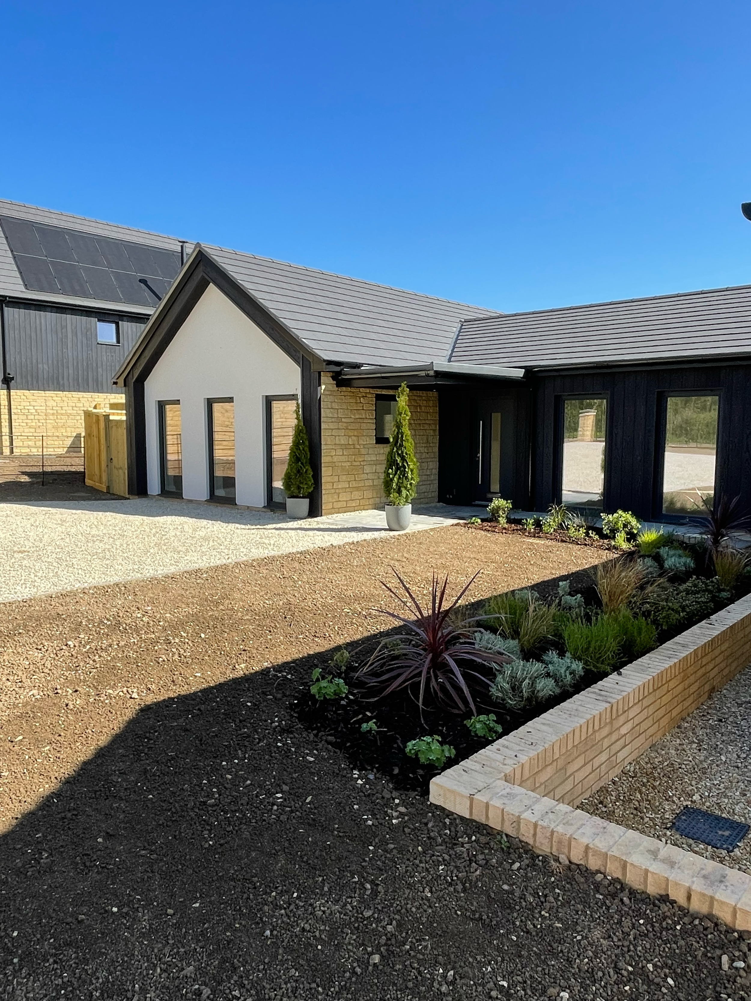 Luxury 4 bedroom bungalow front door in Somerset Broadway