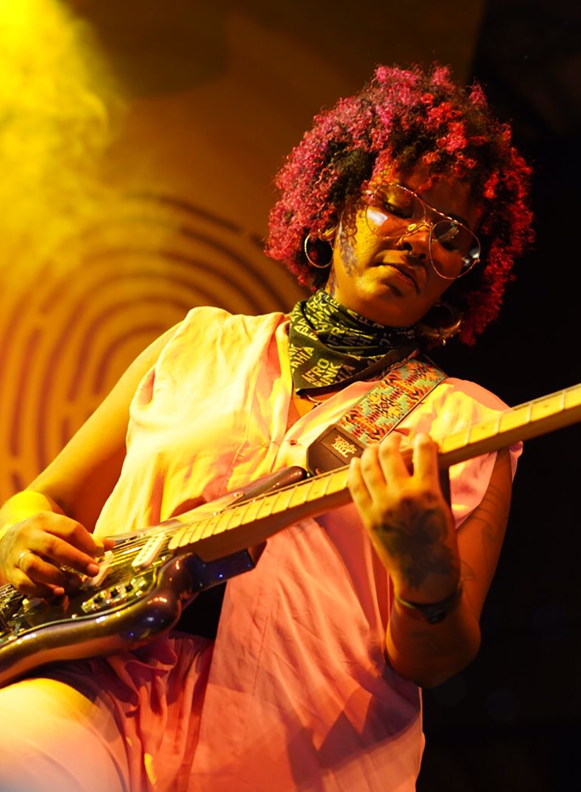 Suyá Nascimento playing guitar Music Teacher Guild