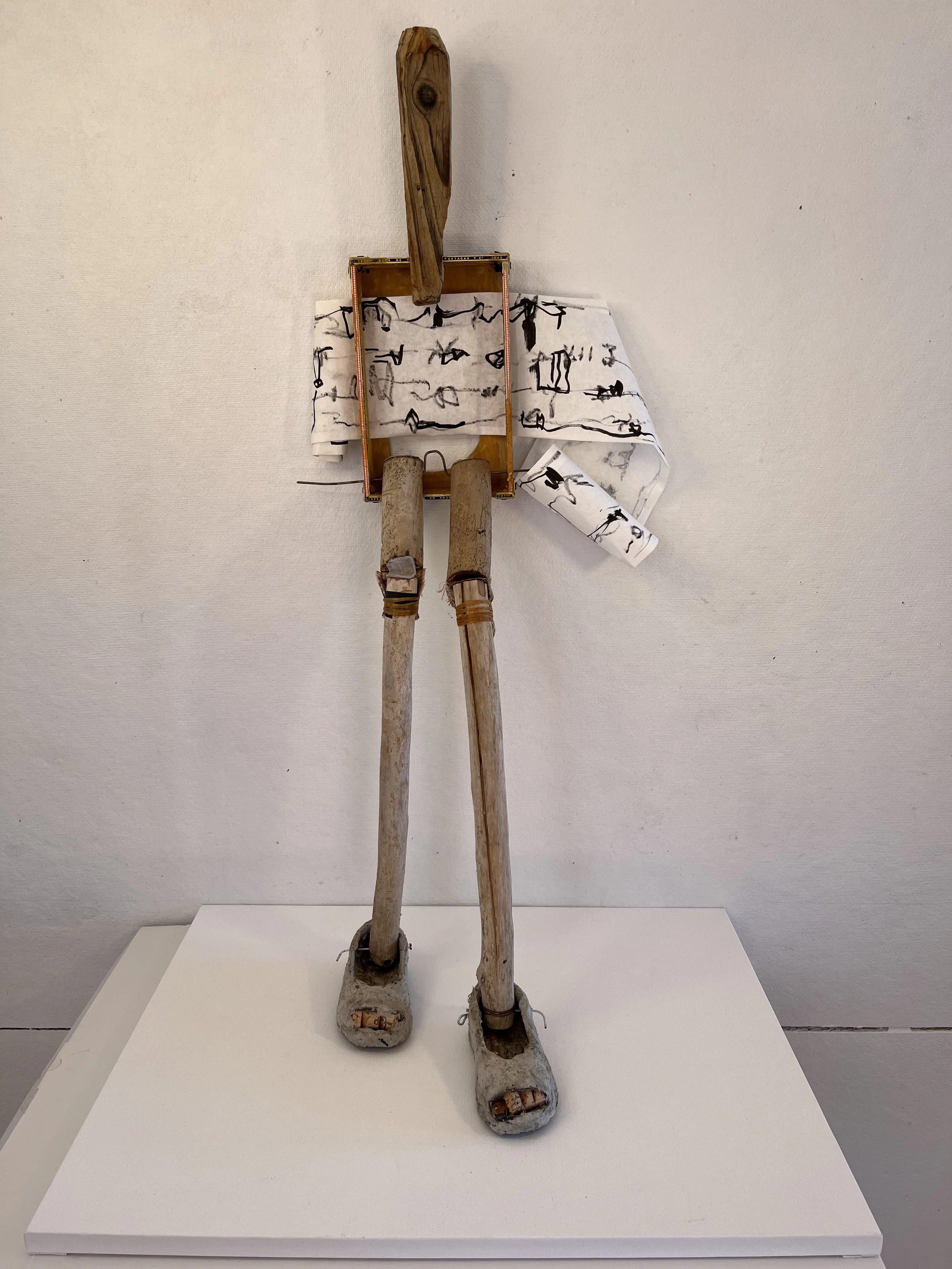 "Scroll Man" 18"H x 7"W x 4"D, Driftwood, corks, coat hanger, paperclay, leather, sinew, wood, marker on parchment scroll, SOLD $2400 Center for Visionary Art, Houston